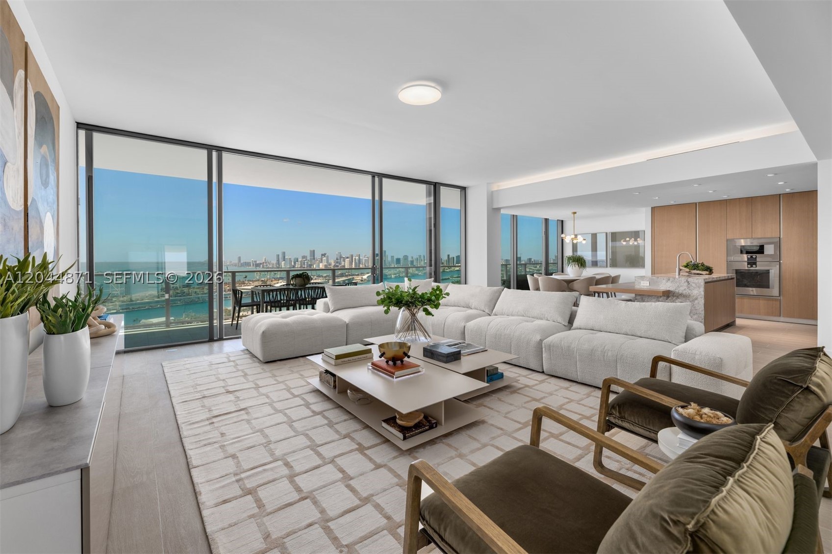 Welcome to Canopy Residence 4102 at Five Park Miami Beach, a spectacular 3,000 SF home in the sky on the 41st floor. This impeccably designed 3-bedroom, 3.5-bath with a spacious den offers 95 linear feet of floor-to-ceiling glass framing unobstructed panoramic views of Biscayne Bay, the Atlantic Ocean, Miami's iconic islands, and the dazzling Downtown skyline with unforgettable sunset vistas. As the tallest residential tower in Miami Beach, Five Park delivers an unparalleled lifestyle with world-class amenities, including a private residents-only beach club with dedicated transportation, Café Flora, in-residence dining, luxury spa and salon services, screening room, business lounge with private offices, fitness and wellness facilities, children's play areas, and 24-hour concierge. Residents also enjoy two dedicated Escalade house cars providing complimentary transportation throughout Miami Beach. Experience the pinnacle of luxury living at Miami Beach's most coveted new address.
