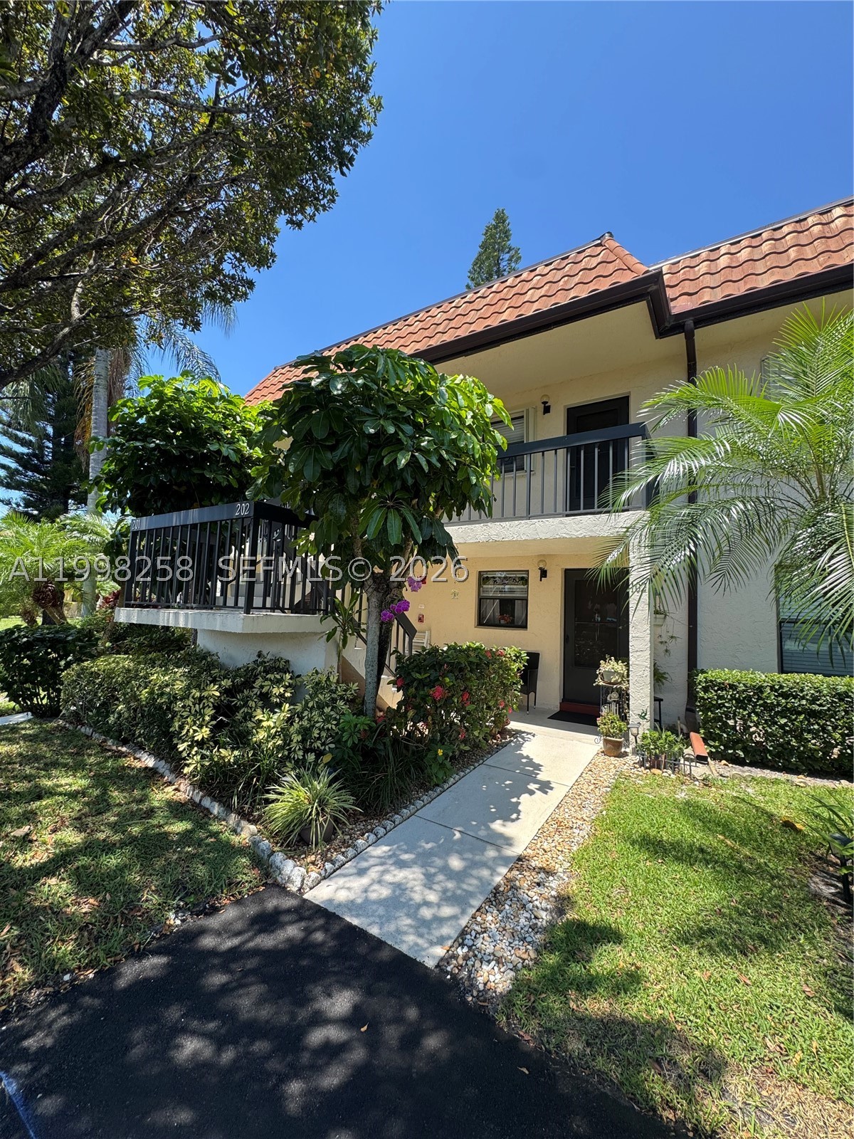 Dreams are for real. This beautifully updated condo in the sought-after 55+ community of Lucerne Lakes offers a bright, airy interior surrounded by serene natural scenery. Featuring two full bathrooms and abundant natural light throughout, the space feels both inviting and refreshed. Enjoy effortless access to the community pool just steps away across the parking area, making relaxation part of your everyday routine. Some images are virtually staged and enhanced.