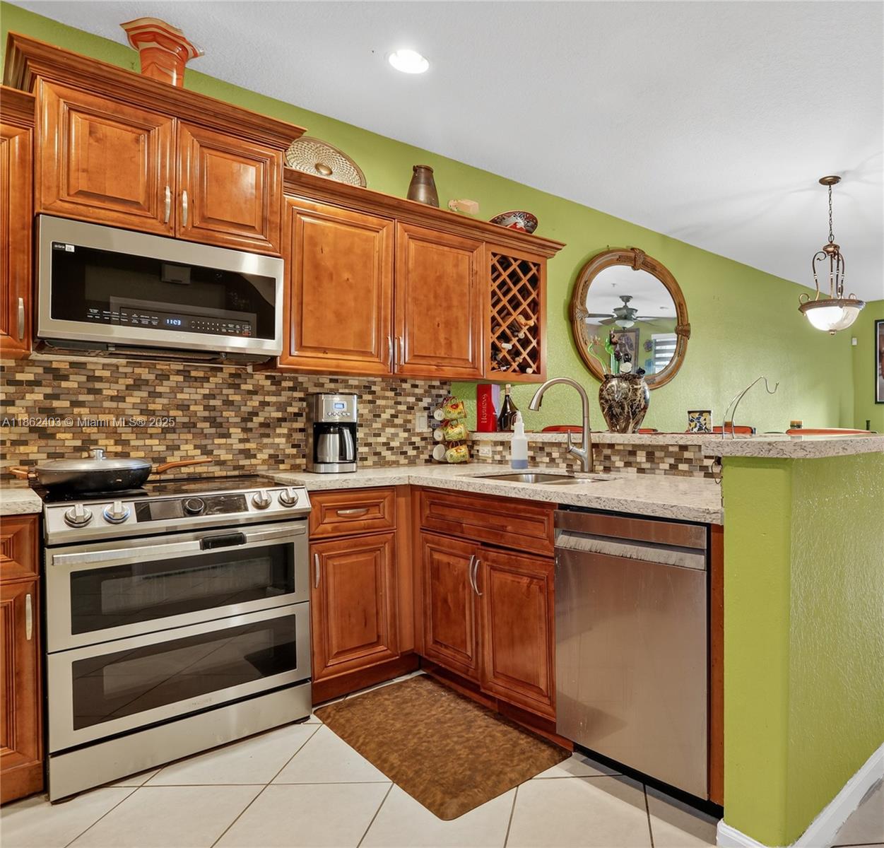 Welcome to Casa at Georgetown , highly desirable community where comfort meets convenience just minutes from Central Broward Park, restaurants, shops, and grocery stores. Gorgeous 3 story townhouse offer 3 spacious beds & 2 1/2 bath. The home features tile & ceramic floors, granite countertops, SS appliances, remodeled bathrooms. The master suite is the entire second floor with dual walk in closets a garden tub, and separate shower. The 2nd and 3rd bedroom suites are on the 3rd floor with laundry room and full bathroom. High-impact windows, hurricane shutters, New AC UNIT (2022). 1CG long driveway fits up to 4 cars! Resort-style amenities include clubhouse, pool, tennis, basketball, playground, and 24-hr security.  Perfect for first-time buyers and families. Schedule your showing today!