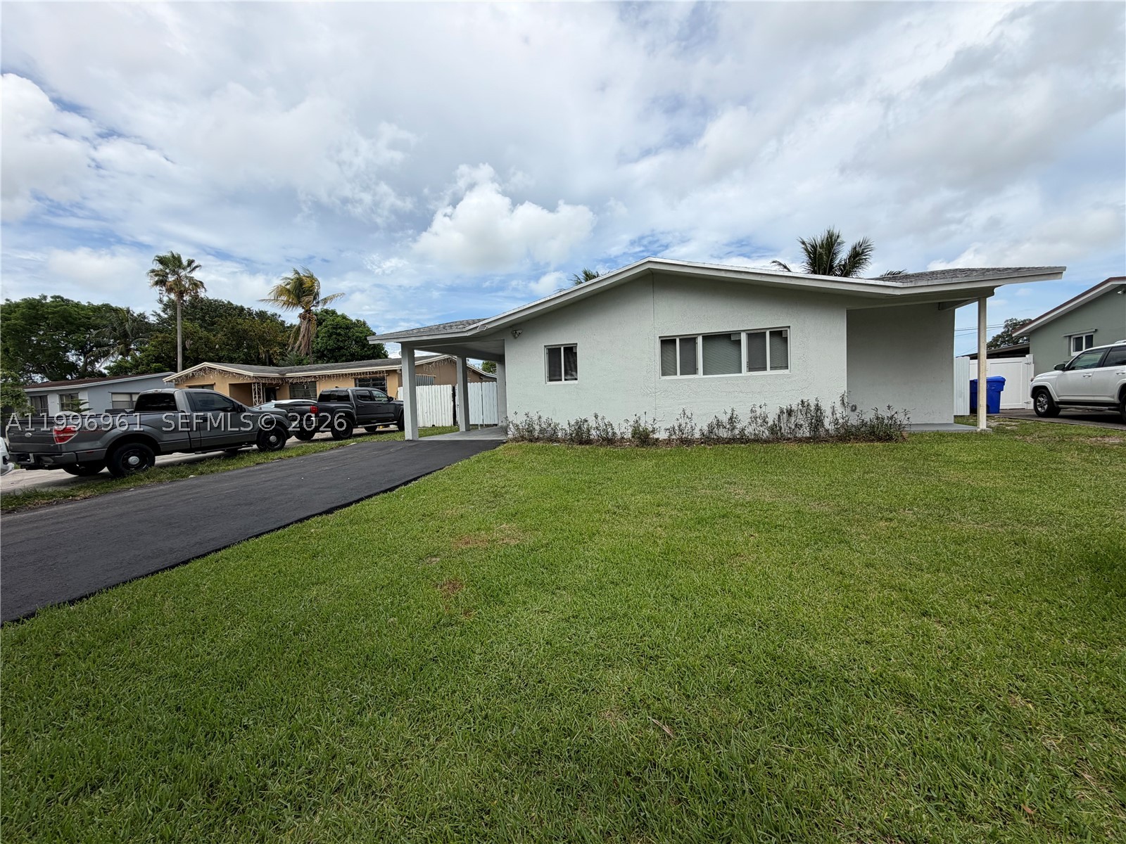$5,000.00 Seller's concession toward Buyer's closing costs or Rate Buy-down! Save up to $400/month on homeowners insurance compared to a standard 1960s Hollywood home! Rebuilt entirely to modern codes in 2023. NO HOA! NO RESTRICTIONS! OK TO LEASE IMMEDIATELY! LOCATION! LOCATION! LOCATION! | EVERYTHING IS NEW | ROOF 2023 | FULL IMPACT GLASS.  Situated on a spacious lot in the heart of Hollywood, The property is minutes from the Seminole Hard Rock Casino (HOTEL GUITAR) This gorgeous spacious 3 bedroom, 2 bathroom, 1 carport, Room for pool.  Brand new roof and full impact-resistant windows/doors for maximum insurance discounts (See The Insurance Quote Attached), All new electrical, plumbing, and high-efficiency HVAC (2023). Open-concept layout featuring recessed LED lighting, and a gourmet chef’s kitchen with custom cabinetry and quartz waterfall countertops. Minutes from Hollywood Beach, and major highways. This turn-key home offers zero deferred maintenance and immediate equity potential. Priced for an immediate sale.