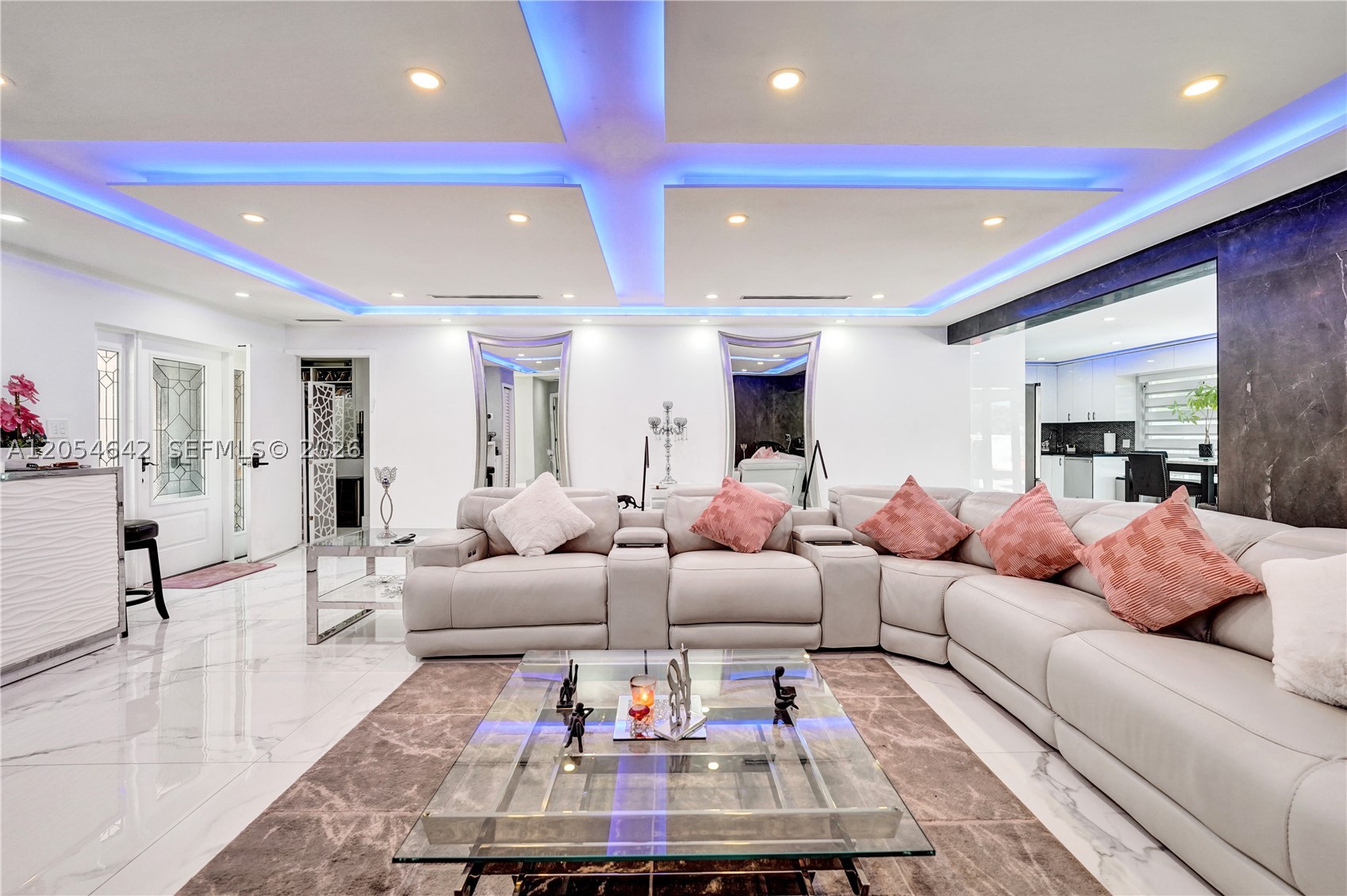 Welcome to this renovated, ultra-modern pool home on an oversized, corner lot in Hollywood Hills. This 2390SF home features 3 spacious bedrooms and 3.5 bathrooms, each bedroom offers the comfort and privacy of its own en-suite bath. The home's open and contemporary layout is designed for both elegant entertaining and everyday living, with stylish interiors that seamlessly blend comfort and luxury.

In addition to the three bedrooms, the property boasts two additional rooms currently utilized as a home office/music room and an expansive, wardrobe/dressing room. These flexible spaces can easily be converted into a fourth and fifth bedroom, providing endless possibilities to accommodate a growing family, guests, or additional work-from-home needs.

Head outside to your private backyard oasis, where a sparkling pool creates the perfect setting for relaxation and entertaining. Whether hosting friends or enjoying a quiet evening at home, this remarkable property offers the ultimate South Florida lifestyle.

This move-in-ready masterpiece combines luxury, location, and flexibility in one extraordinary package. Don't miss the opportunity to make this Hollywood Hills gem your forever home located a short distance from A-rated, Hollywood Hills Elementary, Memorial Regional Hospital and several houses of worship. Thoughtfully renovated from top to bottom, this stunning residence showcases ultra-modern design, sophisticated finishes, and impeccable attention to detail throughout.