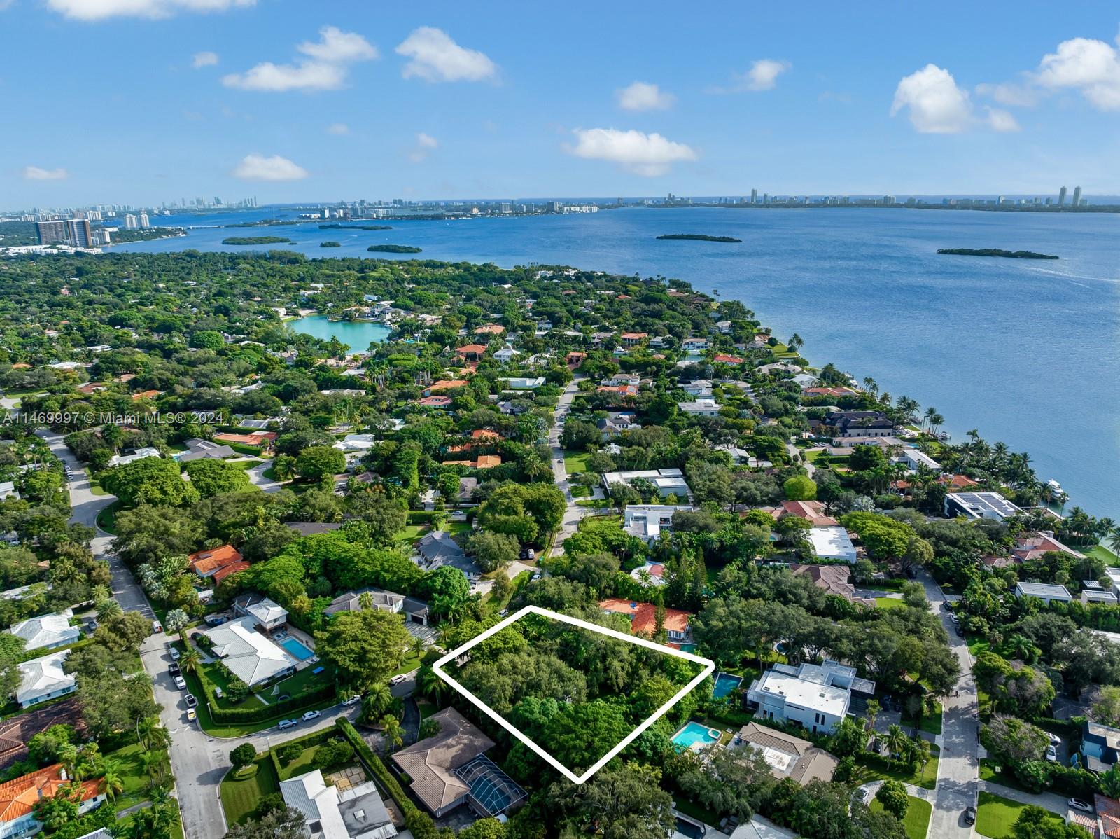 Welcome to this hidden gem located in the highly sought-after Bay Point neighborhood. This meticulously maintained 3-bedroom, 3-bathroom home offers an ideal blend of modern living and tropical charm. The vaulted ceilings and large windows fill the space with natural light, creating a warm and welcoming atmosphere. From its lush landscaping on an oversized lot to its thoughtfully designed interiors, this property is a true tropical oasis waiting to be discovered.