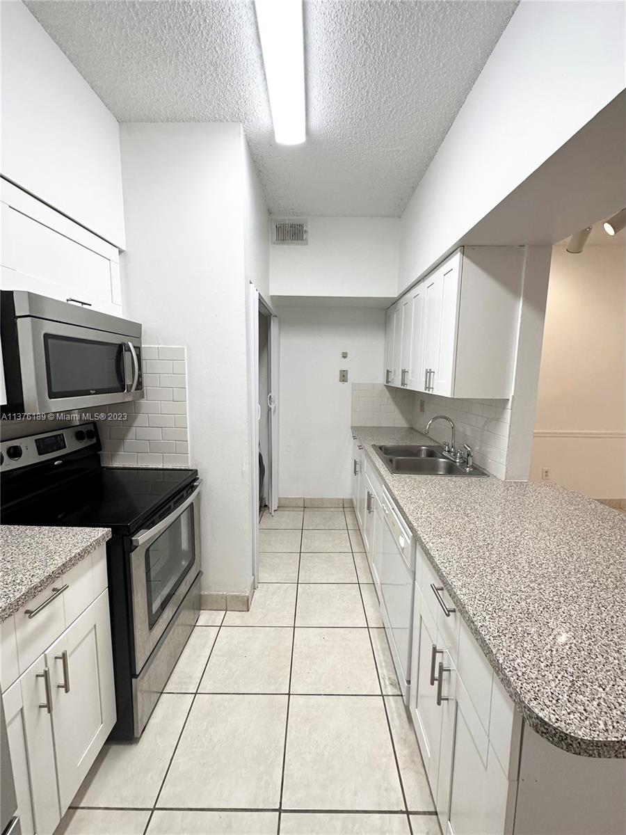 Excellent opportunity to lease this updated corner loft style 1 bedroom 1 bath condo in the gated community of La Hacienda! Unit has a newly updated kitchen with SS appliances and white cabinets. Porcelain tile throughout the first floor and laminate vinyl wood floors in the second floor. Updated bathroom with shower/tub. Large walk-in closet. Washer & Dryer inside the unit. Cozy balcony with a storage closet. 1 assigned parking space. Conveniently located near major highways and shopping centers!