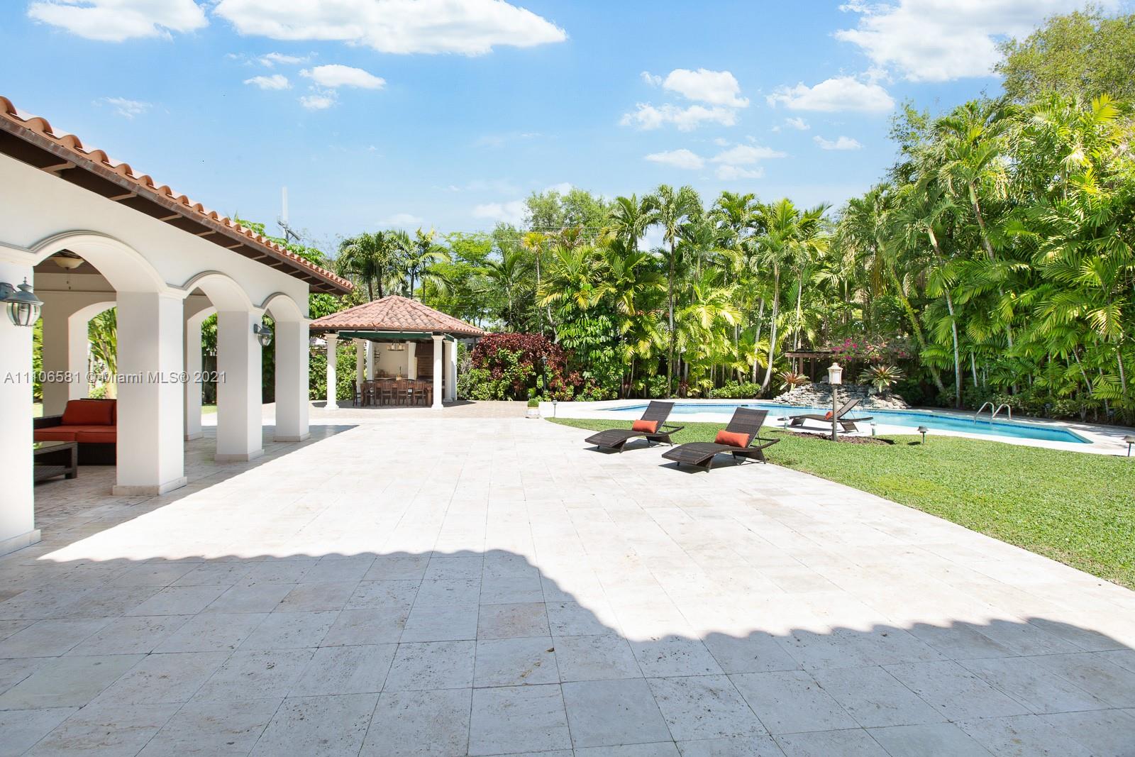 Magnificent 7 bedroom, 7.2 bathroom estate located on the distinguished Coral Way’s oak-lined streetscape near Miracle Mile, golf courses and the esteemed Biltmore Hotel. This timeless residence sitting on an oversized 26,250 sf lot, features an office/library, gym, and sauna. Natural light beams through the elegant living spaces and formal dining room. Lush tropical landscaping enhances the oversized lot, along with a spacious covered terrace, summer kitchen and gazebo, and a glistening oversized pool.