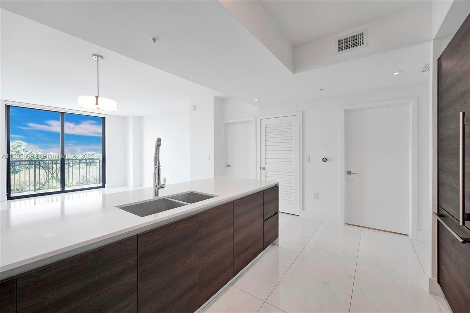 AVAILABLE from 27th of November 2022. Enjoy beautiful views from 2bdr/2bth, 1,032 Sq.f, with the contemporary finishes: Italkraft Cabinets and walk in closets, white quartz countertops, Bosch appliances, Nest Thermostat, keyless locks, spacious bathrooms, washer & dryer in the residence. MM offers a variety of amenities include Impeccable, resort-style amenities and services, saline-heated pool, summer kitchen/BBQ, upscale fitness center, media room, 24HR concierge and security, valet services and more. MM is conveniently located just steps from the fashionable shops of Merrick Park and a school right across the street. Pet-friendly building. Unit has 1 assigned parking space, if needed the tenant can rent another parking from the association for $195.00 plus tax.