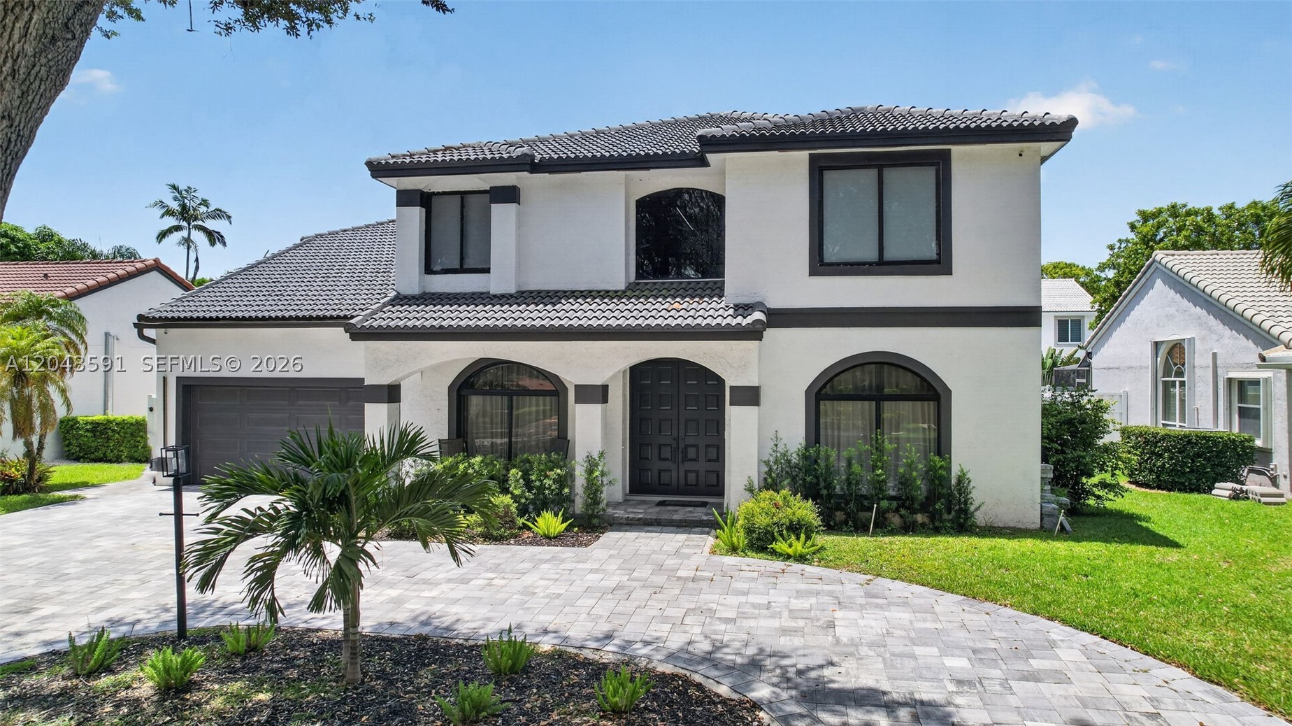 A must see! Completely renovated home with luxury finishes in Embassy Lakes. No detail overlooked and no expense spared. This unique home features an upscale kitchen with Italian cabinetry and large kitchen island, luxury Electrolux refrigerator and built in appliances. Open concept living and dining room designed to perfection, big porcelain tiles flooring throughout and impressive floating stairs with glass staircase, hurricane impact windows and doors. Remodeled bathrooms with extra cabinetry, custom built closets in all bedrooms. Enjoy a large backyard featuring a heated pool, covered lanai, porcelain tile and turf, perfect for relaxing or hosting under the Florida sun. Zoned for top-rated Cooper City schools, 24-hour manned security, tennis, basketball, playgrounds, community pool with a clubhouse, and jogging paths.