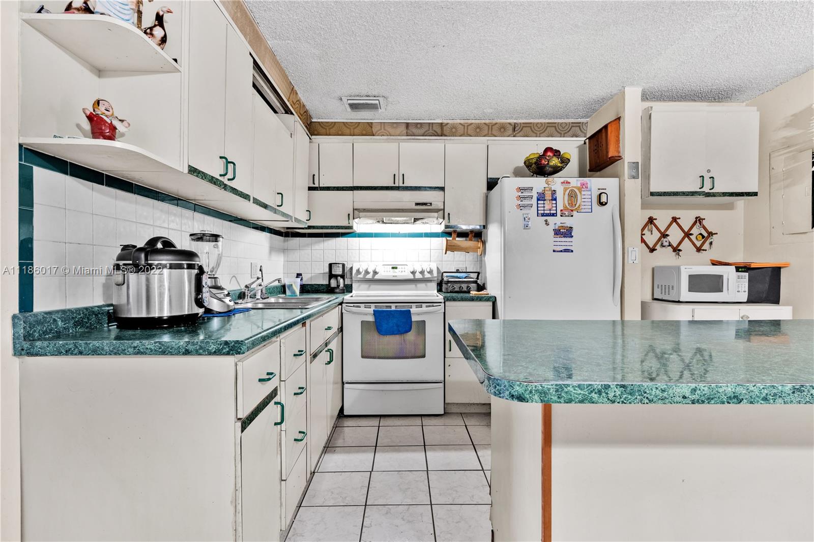 TAMIAMI TWIN VILLAS CONDO - Residential