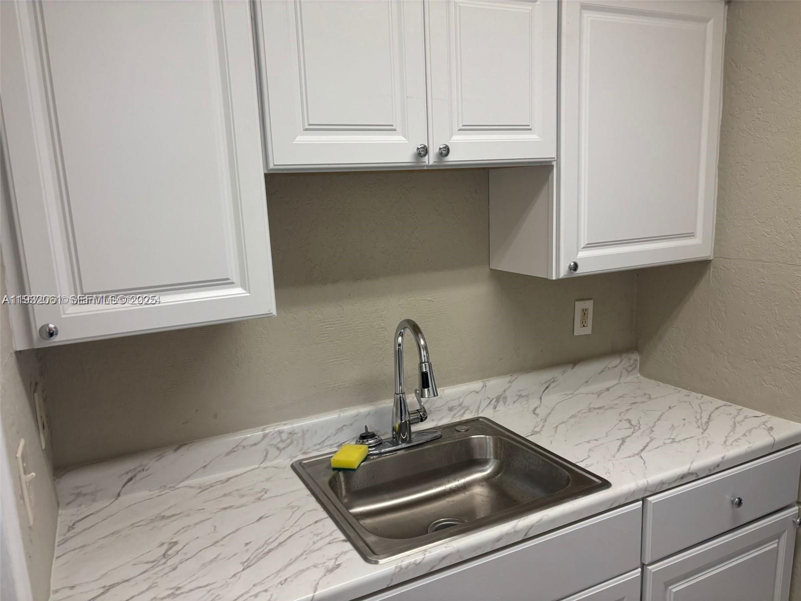 Lovely 2 Bedroom 2 Bath Condo-Style Apartment. NEW APPLIANCES, NEW KITCHEN CABINET INSTALLED, NEW BATHROOM VENETY, Tile flooring throughout. Large bedrooms. Central A/C, Must See! .Rented for $1800, property income from day 1!