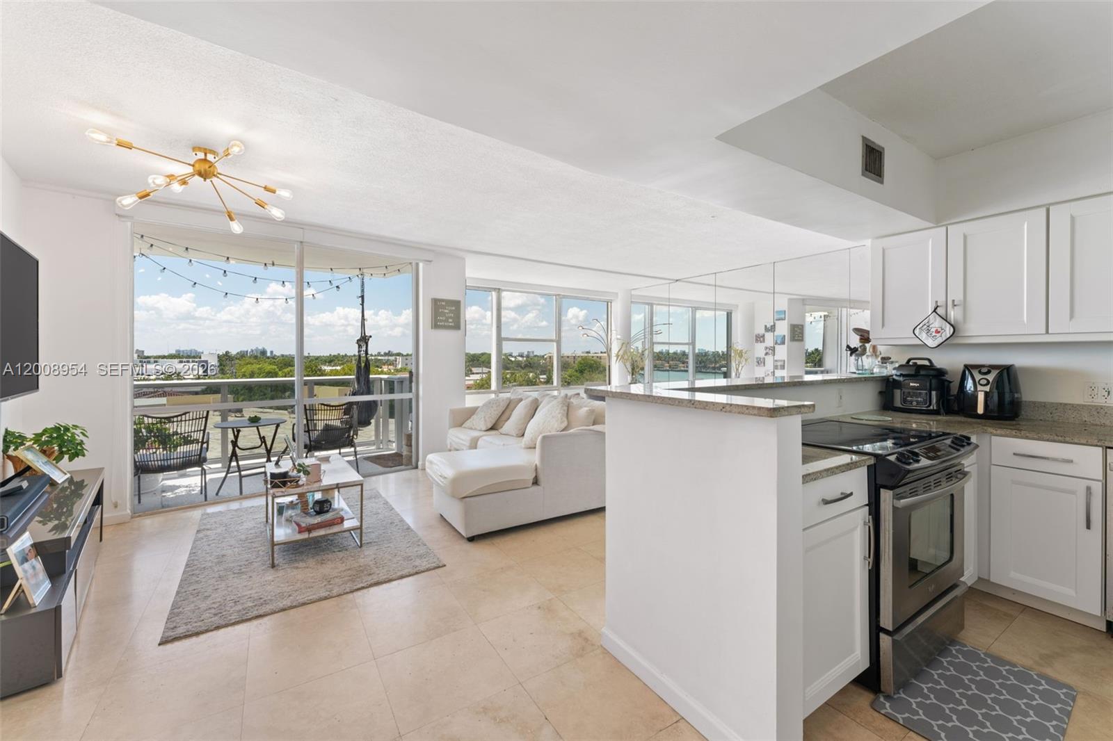 A spacious 1-bedroom/1.5 bathroom unit with gorgeous bay/sunset views awaits you. 421 has marble floors, an ample-sized bedroom with walk-in closet, floor to ceiling windows, open concept living/dining area, and modern finishes. Rent includes 1 valet parking space, storage unit, kayak or SUP storage, water/trash, electricity, and basic cable/internet. Located in the legendary King Cole condominium with recently updated amenities and is only a short, pleasant walk to the beach. Special assessment of additional $419/mth for the next 7 years just began.