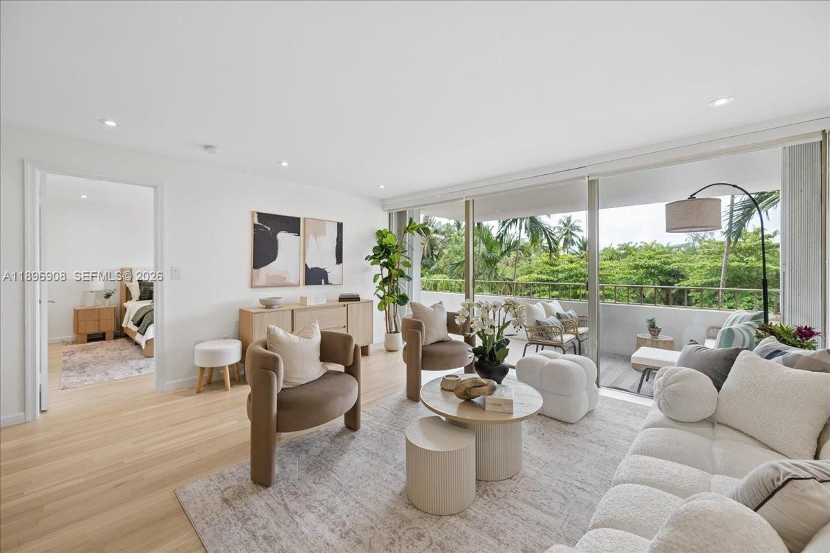 Completely remodeled 1-Bedroom, 2-Bath residence at Commodore Club West. This stunning unit features a brand-new kitchen with modern appliances, beautifully renovated bathrooms, light wood floors, and a spacious walk-in closet. Enjoy serene northeast views of Crandon Park by day and vibrant sunsets by night. Building amenities include direct beach access, a heated pool, gym, party room, sauna, tennis courts, and 24-hour security. Unit #300 next door is also available for purchase—a rare opportunity to combine both and create a custom home step from the beach!