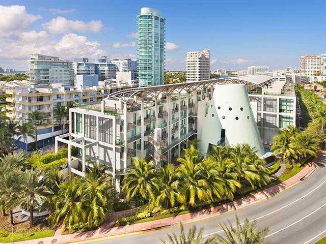 Stunning 2 bed/2 bath plus den residence with beach access across the street.