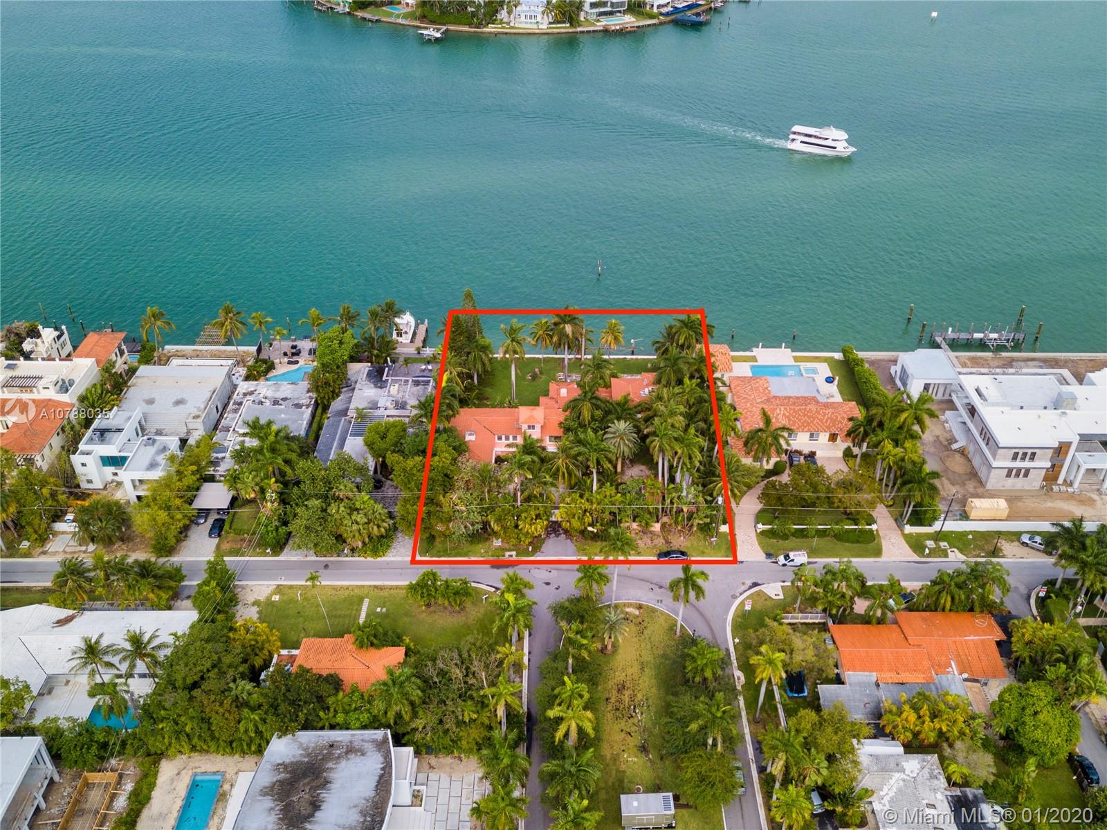 Rare Opportunity to build your mansion with your mega yacht on over a half acre (26,250 sq ft) of unrestricted no fixed bridges ocean access on 150 linear feet of direct waterfront on Hibiscus Island, or possibly split the lots and build two homes.  This police gated island has undergone major improvements with new streets, sewers, bike paths.   Site has a private gate. No houses across the street for extra privacy.  The existing structure on the lot is 7050 sq ft living area and most likely teardown. “Compare Your Construction of a new home to 72 Palm Ave that was built 2017 with 14,200 sq ft that sold in 2019 for $24,570,000 “