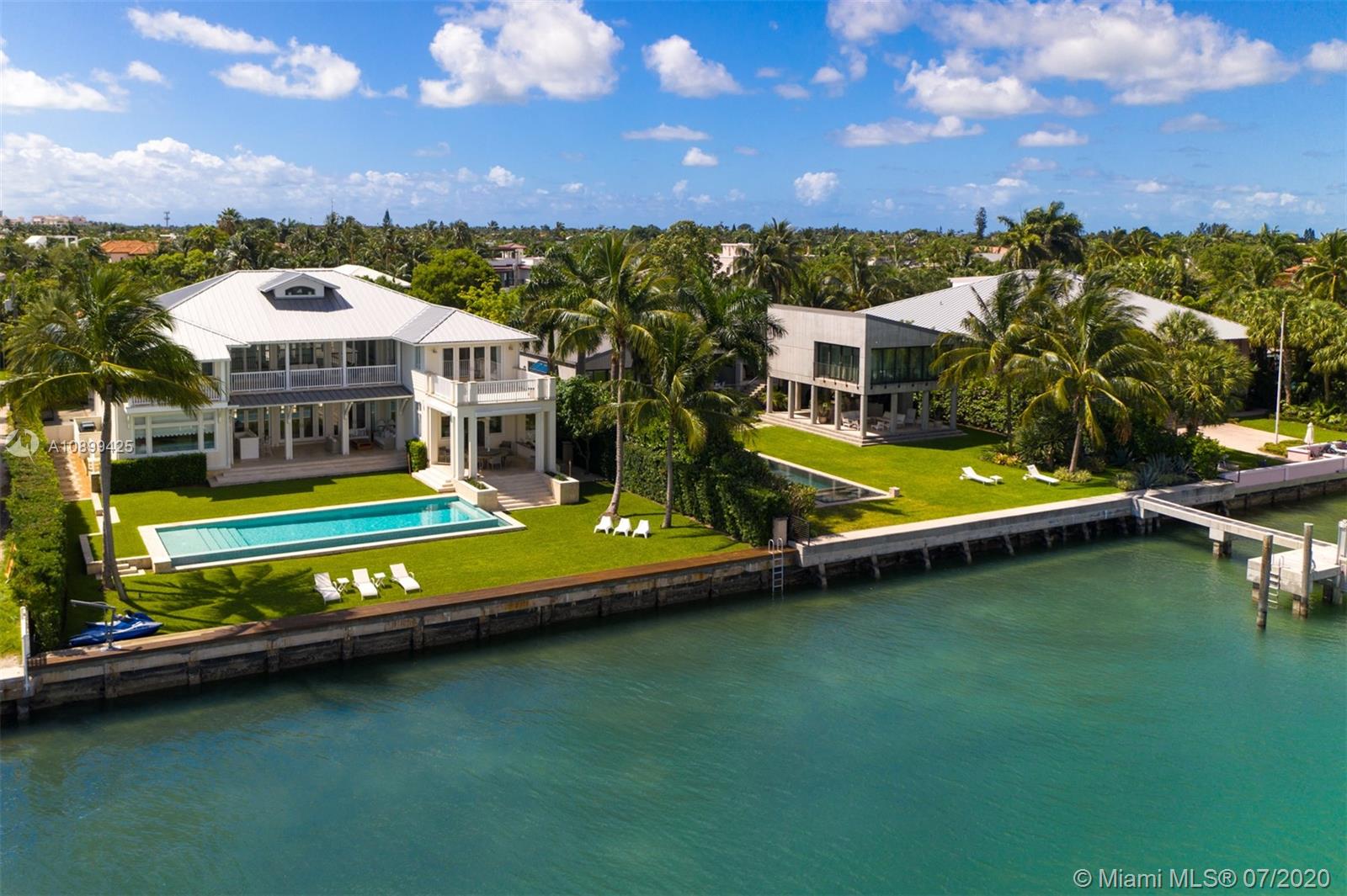 Unique location .Open Bay and Miami Skyline views. Oversized lot. Residence Built in 2014. A home built with the best details and Island design.This elegant island feeling residence has everything to captivate you. hydraulic Elevator, offers Bedrooms on 1st.and 2nd. floor All bedrooms en suite, 3  bedrooms in 2nd Floor , master suite with his & her bathrooms & private terrace overlooking the bay. independent guest suite w/Wood floors & balcóny. 1st  Floor w/ formal dining, Italian Kitchen, breakfast área, reception área overLooking Pool and Bay .Family room, wine cellar, library, guest area. Beautiful attic room w/easy access. 3 car garage, 11,106 sq.ft. (7,392 sq.ft. AC space). 2,306 sq.ft. terraces/covered porch. island living at the BEST. Must See to appreciate. Umbranded Matterport.