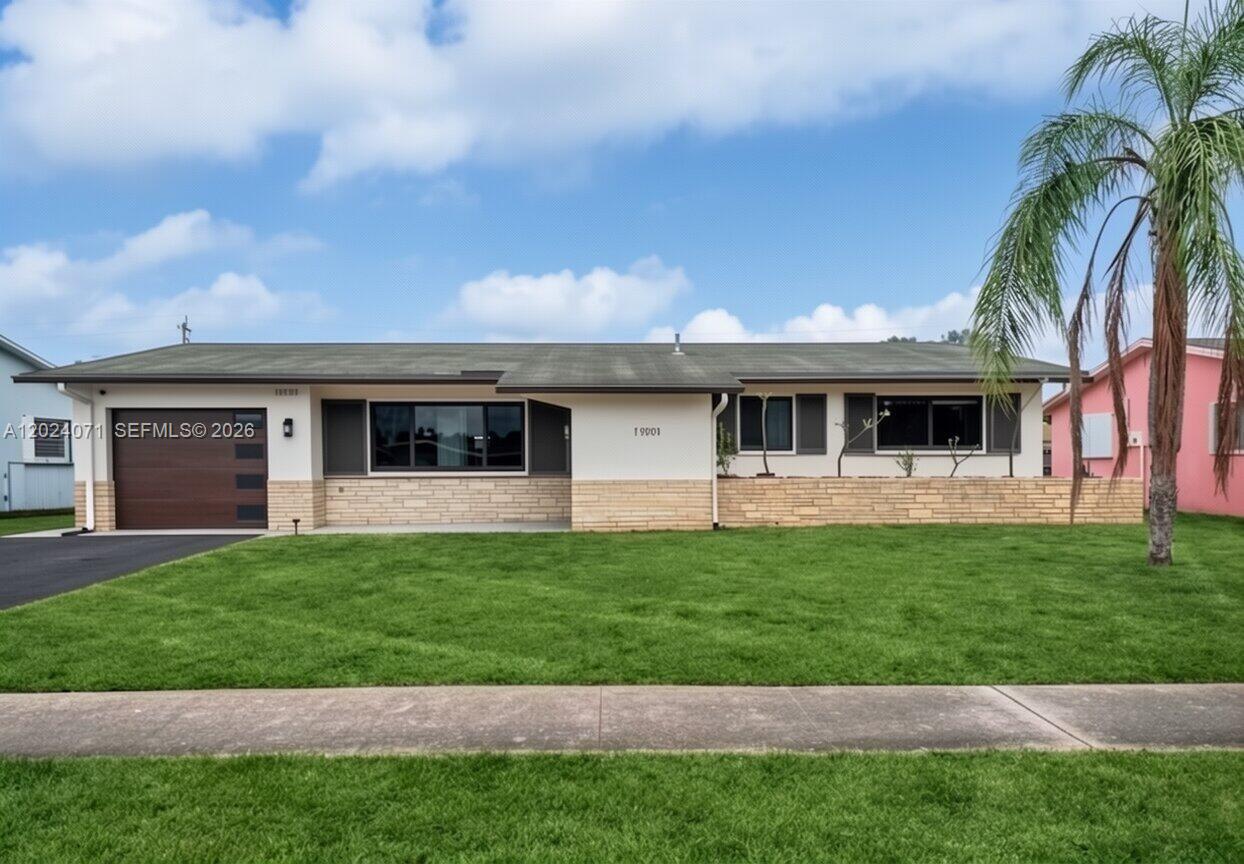 Beautifully remodeled single-family home in the heart of Pembroke Pines featuring 3 bedrooms, 2 bathrooms, and a spacious open-concept layout for comfortable living and entertaining. This move-in ready property boasts updated vinyl flooring throughout, recessed lighting, impact windows and doors, and a modern kitchen with quartz countertops, stainless steel appliances, induction cooktop, custom vent hood, and a wood-block center island.

An oversized fenced backyard with a covered and screened patio and outdoor shed. Additional upgrades include a newer HVAC system, updated garage door opener with camera, and refreshed garage finishes. Conveniently located near top-rated schools, parks, shopping, dining, and major highways with no mandatory HOA.