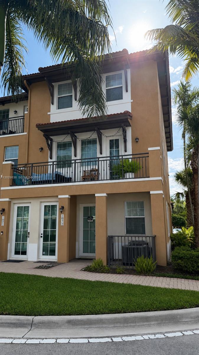 Bright corner unit with abundant natural light from multiple windows. Features 3 primary suites and a half bath on the main level. Ceramic floors throughout, except on stairs. Custom storage closet. Located in gated Cobblestone community. HOA includes high-speed internet, burglar alarm monitoring, cable, security patrol, community pool, tot lots, fitness center, on-site manager, flood insurance, and structure insurance. Near I-75, Pembroke Gardens, and Pembroke Lakes Mall.