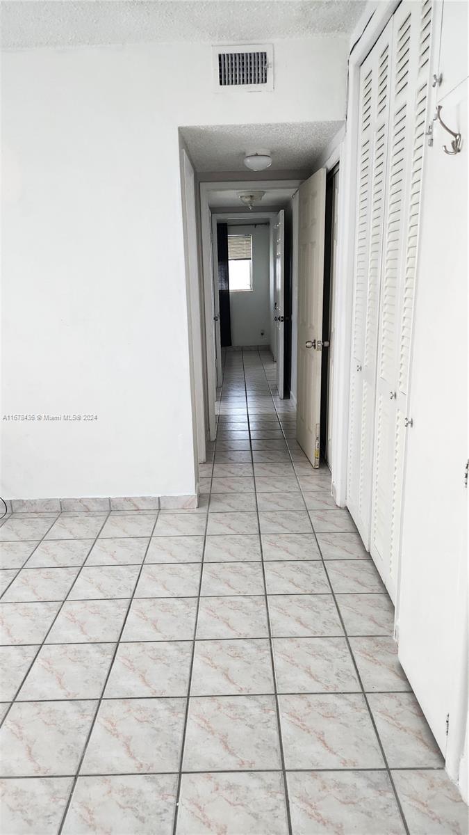 Although a picture is worth a thousand words, nothing beats a personal visit to this wonderfully large 2 beds 2 baths unit in Nort Miami beach. This is a magnificent corner unit on the second floor with a gorgeous street view. Property has beautiful tiles all throughout, renovated kitchen with marble countertop, large living room and dining room, supersized master bedroom, separate entrance through the kitchen. Near shopping malls, Home Depot, Walmart, high school and middle schools. The seller will entertain your offer, but it is priced to sell.