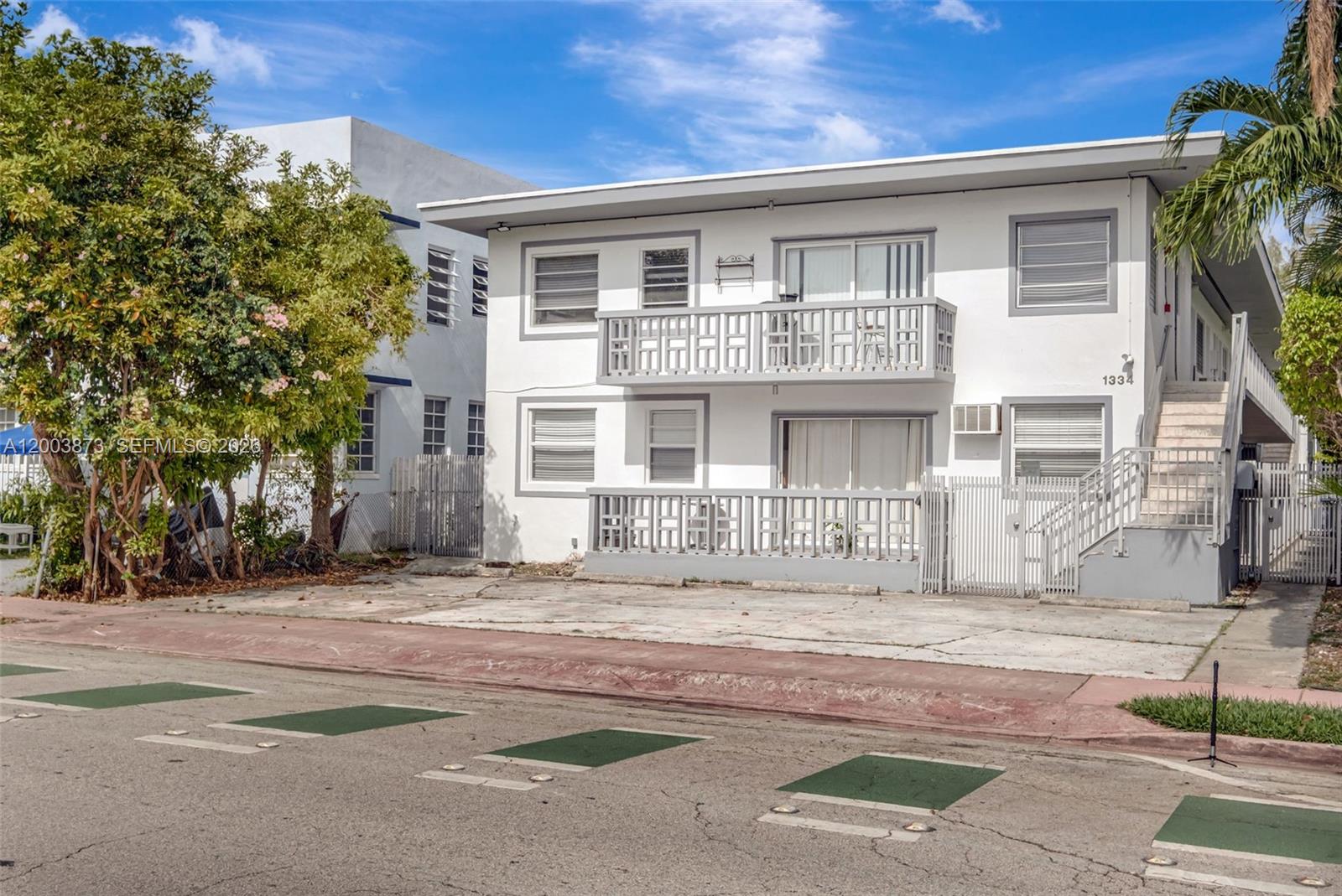 Bright top-floor 1BD/1BA in the heart of South Beach! This 620 sq ft residence offers a thoughtfully designed layout with great natural light and a seamless flow from the living area to a cozy bedroom and private, petite balcony. The unit features a brand-new impact front door, ceiling fans, and a sleek chef-style galley kitchen with custom cabinetry. Additional highlights include charming wood shutters, covered Parking, and the potential to install an in-unit washer/dryer (community laundry onsite). Perfectly located just steps from Lincoln Road, Española Way, and only 4 blocks to Ocean Drive and the beach. Enjoy walkable access to Flamingo Park, top dining, shopping, and everything that makes Miami Beach living so desirable. Ideal for an end-user or investor, with low HOA fees and strong rental appeal.