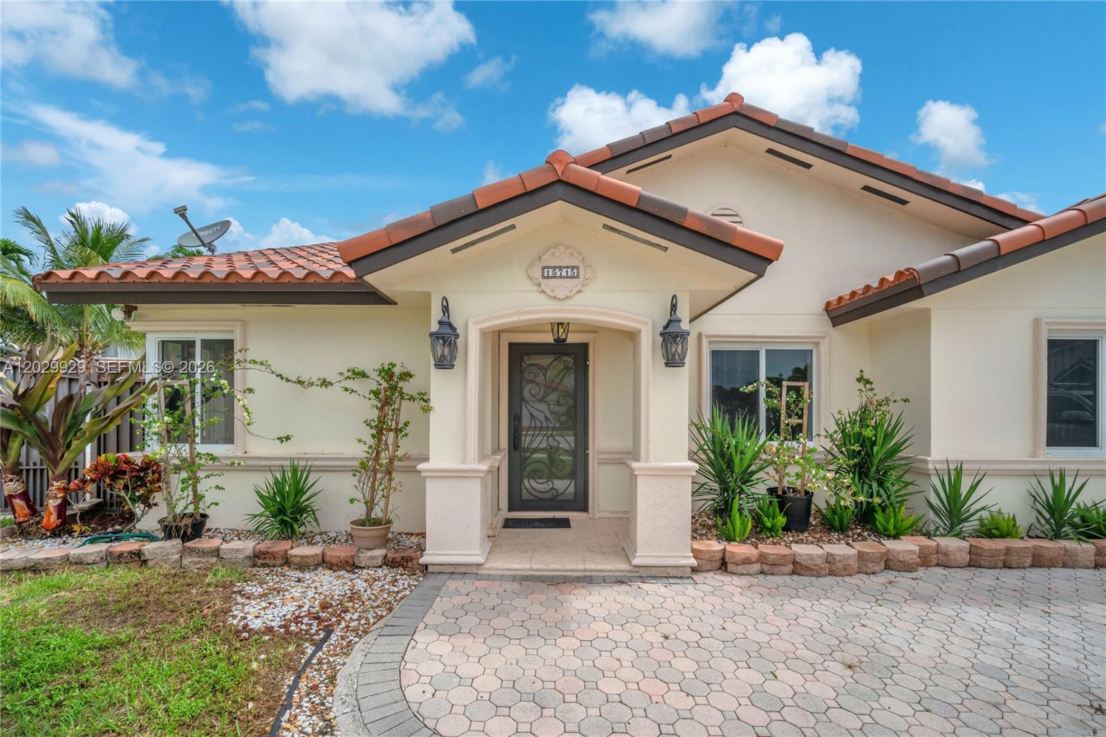 Welcome to this exceptional 4-bedroom, 2-bathroom home in sought-after Lago Mar, offering comfort, style, and modern updates throughout! This move-in-ready residence features high-impact windows and doors, a newer roof, newer A/C, and a well-designed layout for comfortable living. The kitchen offers wood cabinetry, granite countertops, and stainless-steel appliances, while tile flooring throughout the main living areas and new laminate wood flooring in the bedrooms add warmth and style. The primary suite includes a beautiful Mediterranean/Tuscan style bathroom. Outside, enjoy a paved backyard with double-side gates, providing ample space for outdoor enjoyment and convenient boat, trailer, or additional vehicle storage. The paved driveway offers plenty of parking. Ideally located near shopping centers, restaurants, and schools. Available for immediate occupancy.**