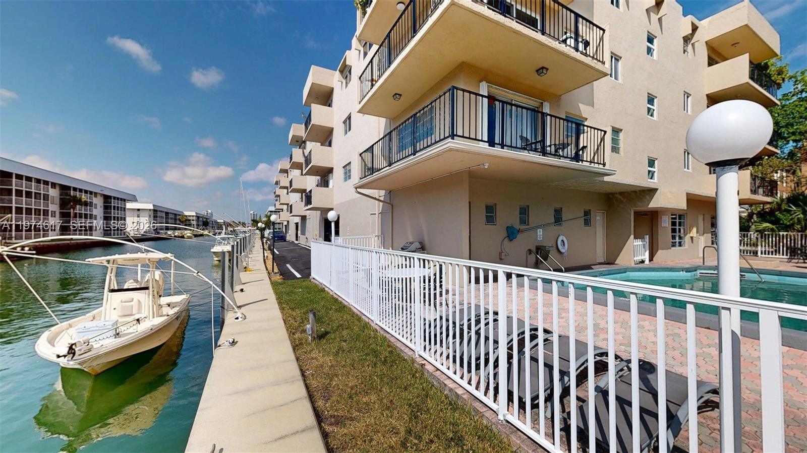 Enjoy a spacious open layout with abundant natural light, a large private balcony perfect for morning coffee and sunset relaxation. Waterfront living in the desirable Eastern Shores community! This fully furnished spacious 1-bedroom, 1.5-bath residence offers approximately 1,032 square feet of living space. The thoughtfully designed layout features a large primary suite with walk-in closet and en-suite bath, plus a convenient half bath for guests. New water heater, new AC unit. Located in a well-maintained waterfront building with secured entry, elevator access, and community pool. Assigned covered parking.
The building has successfully passed 40 Years Recertification, No Pending Assessments, building has reserves. 
Just minutes from Sunny Isles Beach, Oleta River State Park, shopping, dining, and major roadways. Eastern Shores residents will benefit from upcoming water taxi service and new construction and redevelopment projects by Dezer Development  that enhance lifestyle and long-term value.