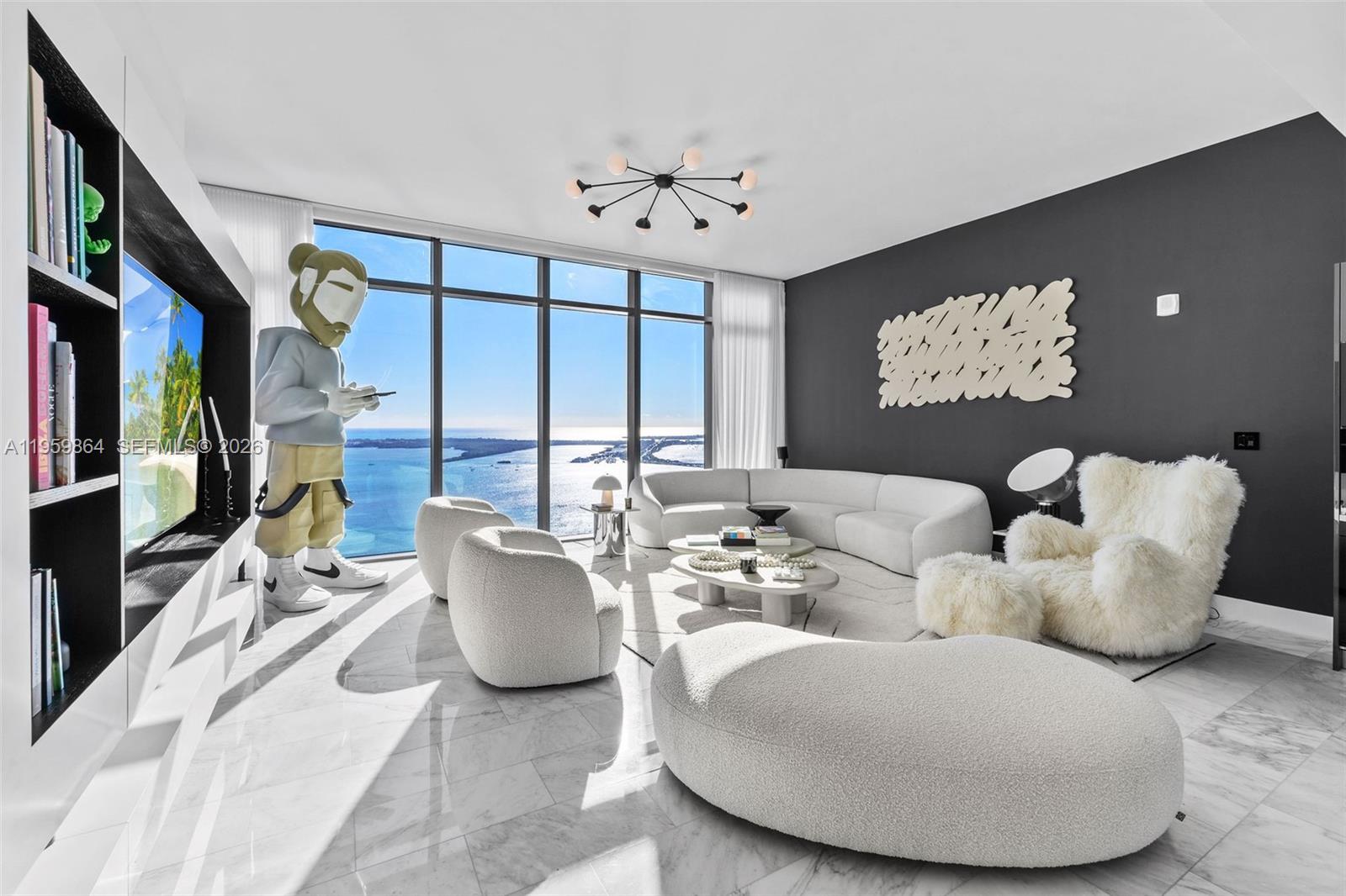 High above Brickell on the 44th floor of Echo, this exceptional corner residence captures sweeping 180-degree views of Biscayne Bay, the Brickell skyline, and the Miami Beach horizon. Floor-to-ceiling windows and soaring 12-foot ceilings flood the home with natural light, while refined marble floors and marble kitchen countertops create a seamless, sophisticated aesthetic throughout, complemented by generous gallery-style wall space ideal for displaying art.

The thoughtfully designed kitchen is outfitted with premium Sub-Zero and Wolf appliances. Thoughtful upgrades include a Lutron lighting system, Apple Home technology, living room surround sound, keyless entry, motorized blinds and shades, and beautifully built-out closets for effortless living.

Enjoy seamless indoor-outdoor flow with an electric grill on your private terrace that's perfect for taking in the dramatic water and city views. 3 parking spots included.

Echo Brickell offers world-class amenities, including a resort-style infinity pool, top-tier fitness center, and luxurious spa, all in one of Miami’s most desirable locations. Ideally positioned in Brickell for easy in-and-out access, this residence embodies modern luxury with a refined, elevated vibe.