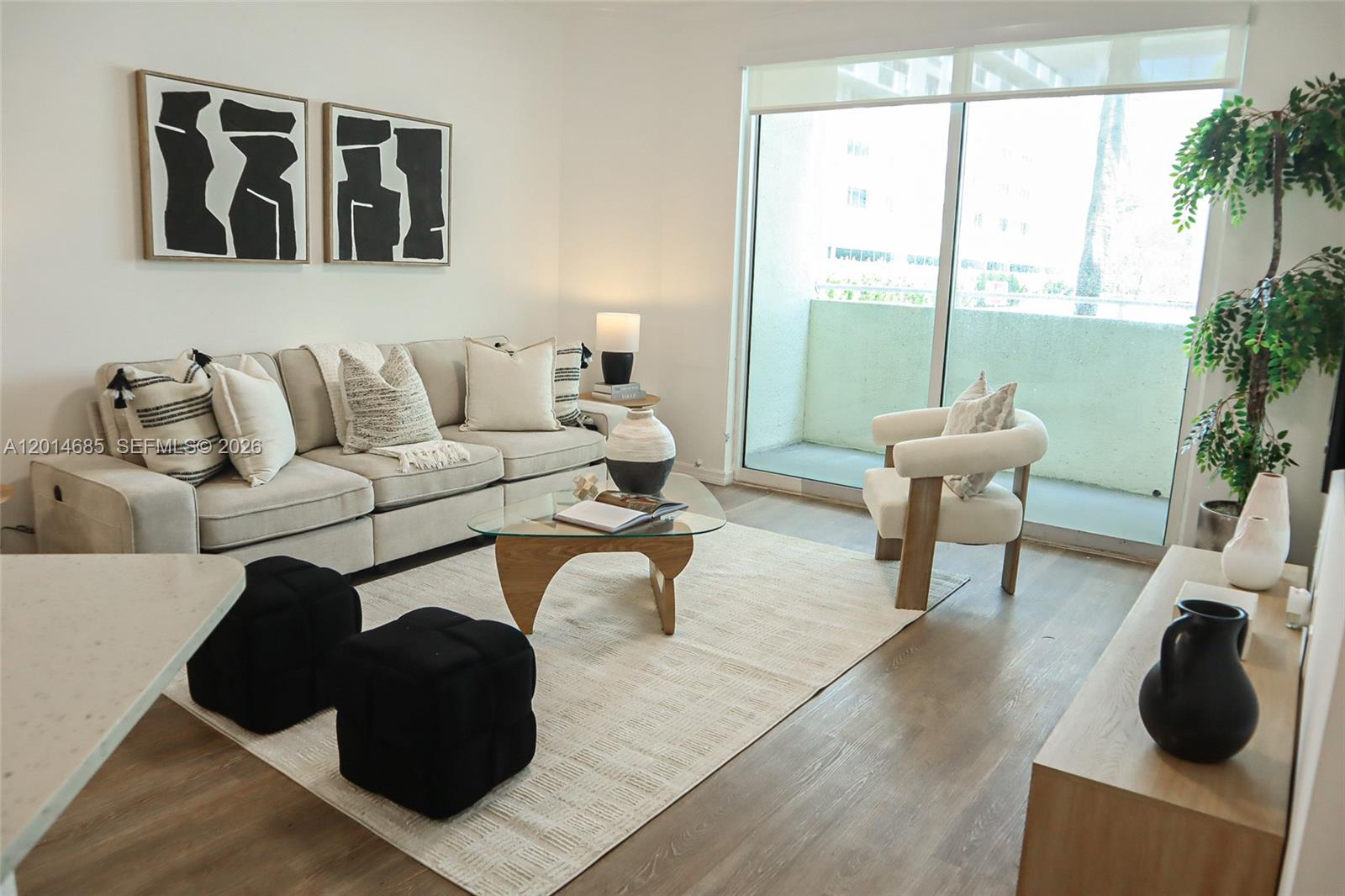 Fully renovated 2-bedroom, 2-bath residence in the heart of Surfside, located just across the street from the beach. This bright and spacious unit features an updated kitchen, modern flooring, open living areas, in-unit washer and dryer, and a functional split-bedroom layout for added privacy. Includes assigned parking and access to the oceanfront building directly across the street, offering direct beach access plus resort-style amenities including a beachfront pool, fitness center, BBQ area, game room, and more. Ideally located within walking distance to Bal Harbour Shops, restaurants, cafés, supermarkets, and everything Surfside has to offer. A perfect opportunity to enjoy the ultimate Miami beach lifestyle.