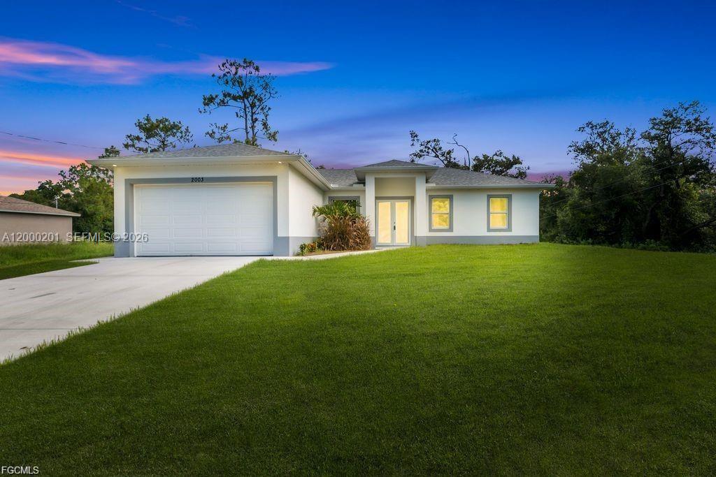 Discover the epitome of contemporary living in this exquisitely crafted new construction home, where architectural finesse meets unparalleled comfort in the heart of flourishing Lehigh Acres. This meticulously designed three-bedroom, two-bathroom residence spans 1,493 square feet of thoughtfully orchestrated living space, showcasing the finest attention to detail that discerning homeowners have come to expect------- Refer to Supplemental Remarks for full description!!!