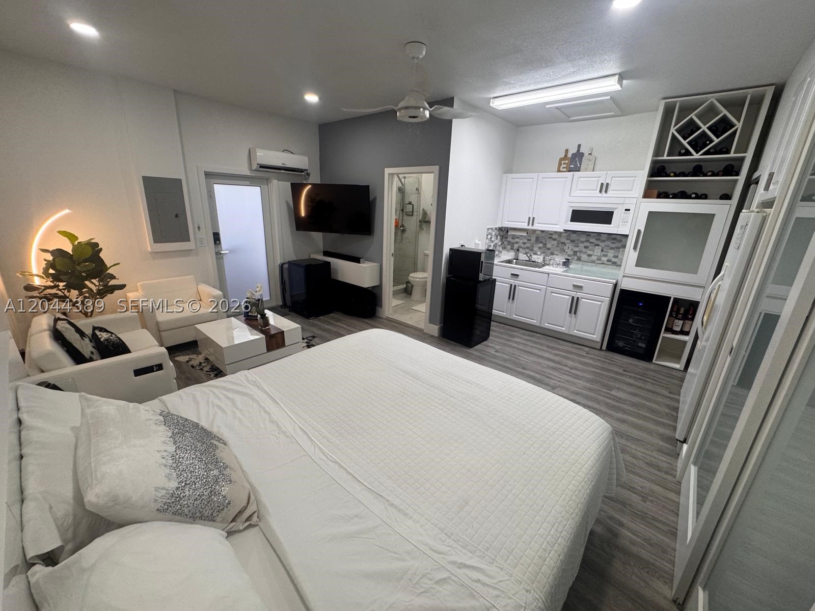 Well-maintained efficiency featuring a private entrance with keypad access for added convenience and security. Offers ample closet space, an outdoor mini storage area, and trash service is included. A comfortable and functional place to call home.