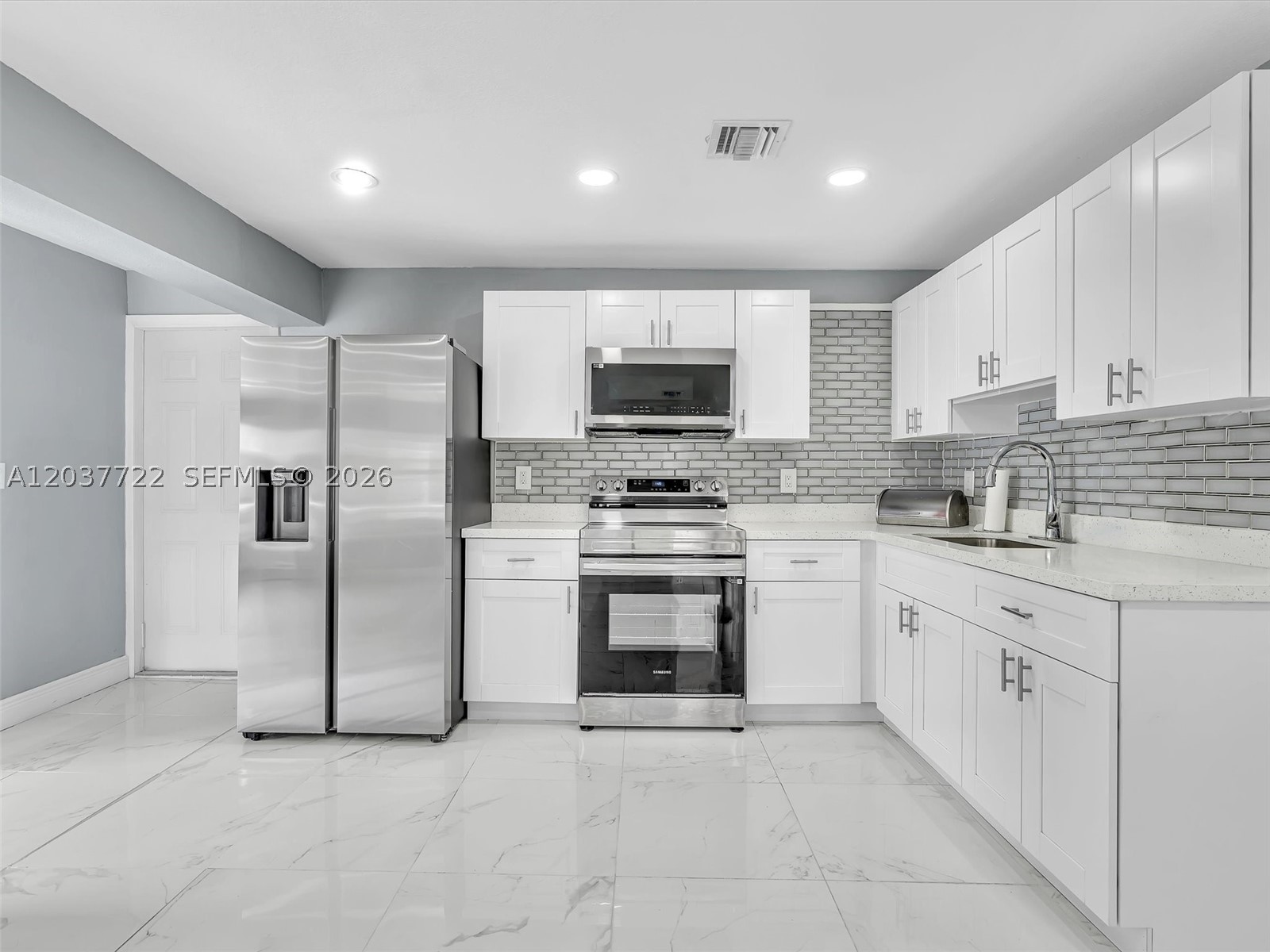 Fully renovated 3BR/1BA single-family home on a beautiful canal lot in Deerfield Beach. Features approximately 1,150 SF of updated living space with modern finishes, spacious yard, and tranquil waterfront views. Conveniently located near shopping, dining, major highways, and beaches. Tenant occupied—showings by appointment only. Don't miss this move-in-ready waterfront gem!