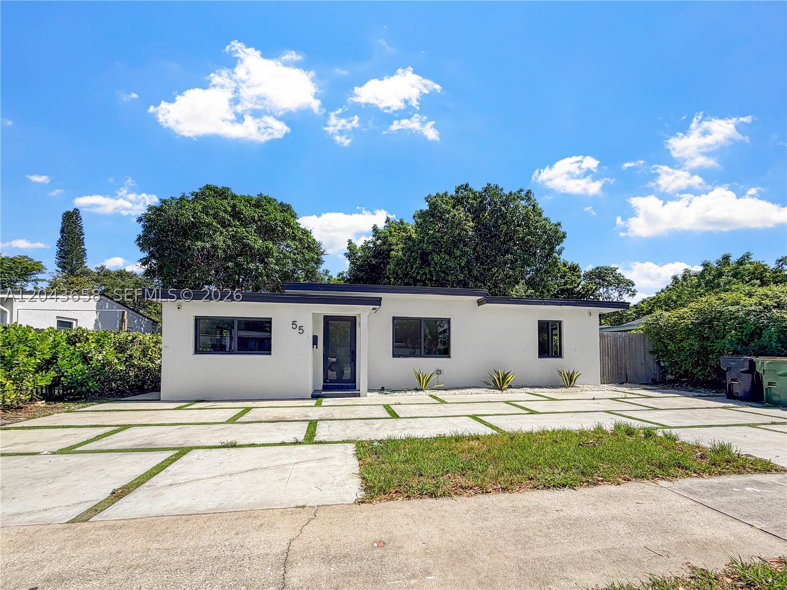 Beautifully updated single-family home located in the heart of North Miami! This move-in ready residence offers 3 bedrooms, 1 bathroom, and approximately 1,088 square feet of thoughtfully updated living space. Features include a modern kitchen, updated bathroom, new wood laminate flooring throughout, hurricane impact windows, a new roof, central A/C, and spacious closets in every bedroom. Outside, you’ll find a new contemporary circular driveway with parking for multiple vehicles and an oversized 8,100 SF fenced lot featuring large shade trees, covered patio area, and plenty of room for entertaining, a future pool, or storing a boat or RV. Conveniently located just minutes from I-95, Biscayne Blvd, Barry University, FIU Biscayne Bay Campus, shopping, restaurants, schools, and the beaches. No HOA! Whether you’re looking for your next home or a great investment opportunity, this property offers comfort, style, and an unbeatable location.