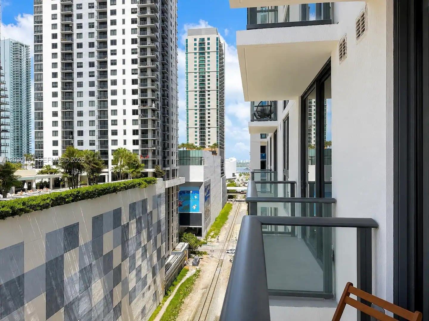Experience effortless ownership in this beautifully curated, fully furnished 1-bedroom residence at The Crosby Miami Worldcenter. This turnkey unit is completely move-in and rental ready, including designer furnishings, linens, towels, a fully equipped kitchen with cookware, dishware, small appliances, and everything needed for immediate use or short-term rental operations. Enjoy stunning sunset and city views from your private balcony, Bosch appliances, in-unit washer and dryer, smart lock technology, and floor-to-ceiling windows that fill the space with natural light. Internet is included in the HOA, and pets are welcome. Residents and guests enjoy access to two full floors of resort-style amenities, including a state-of-the-art fitness center, spa, movie theater, coworking spaces, conference rooms, lounges, game room, and 24/7 concierge service. Located in the heart of Miami Worldcenter, just steps from Kaseya Center, Brightline Station, Bayside Marketplace, dining, shopping, entertainment, and PortMiami. A true turnkey investment opportunity with strong rental demand and immediate income potential.