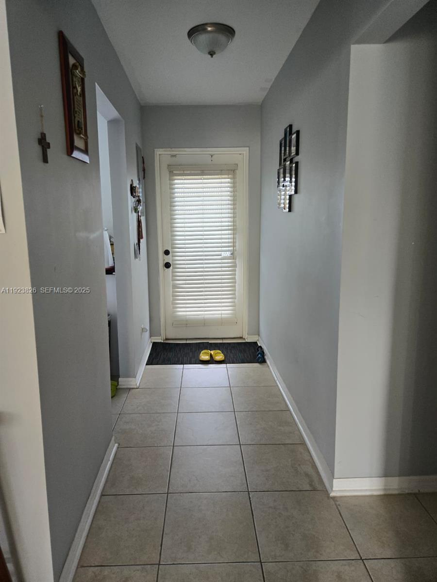 Upgraded 2-bed, 2-bath home in the highly sought-after Oriole Golf & Tennis community! Featuring elegant tile flooring and great views, no neighbors above with elevator access and close to the shared laundry facility on the same floor.  Enjoy living with top-notch amenities, including a pool, exercise room, billiard room, library, shuffleboard, and more! Plus, with the HOA reserves in place, you can enjoy added financial security and peace of mind. Don’t miss out on this incredible opportunity—schedule your showing today! Seller Financing available with 15% down and HOA approval, at 8-10% interest based on credit. The property is currently rented and will be vacated at the end of May 2026. Great tenants, but they are moving out of town. No rental for the new owner until after the first year.