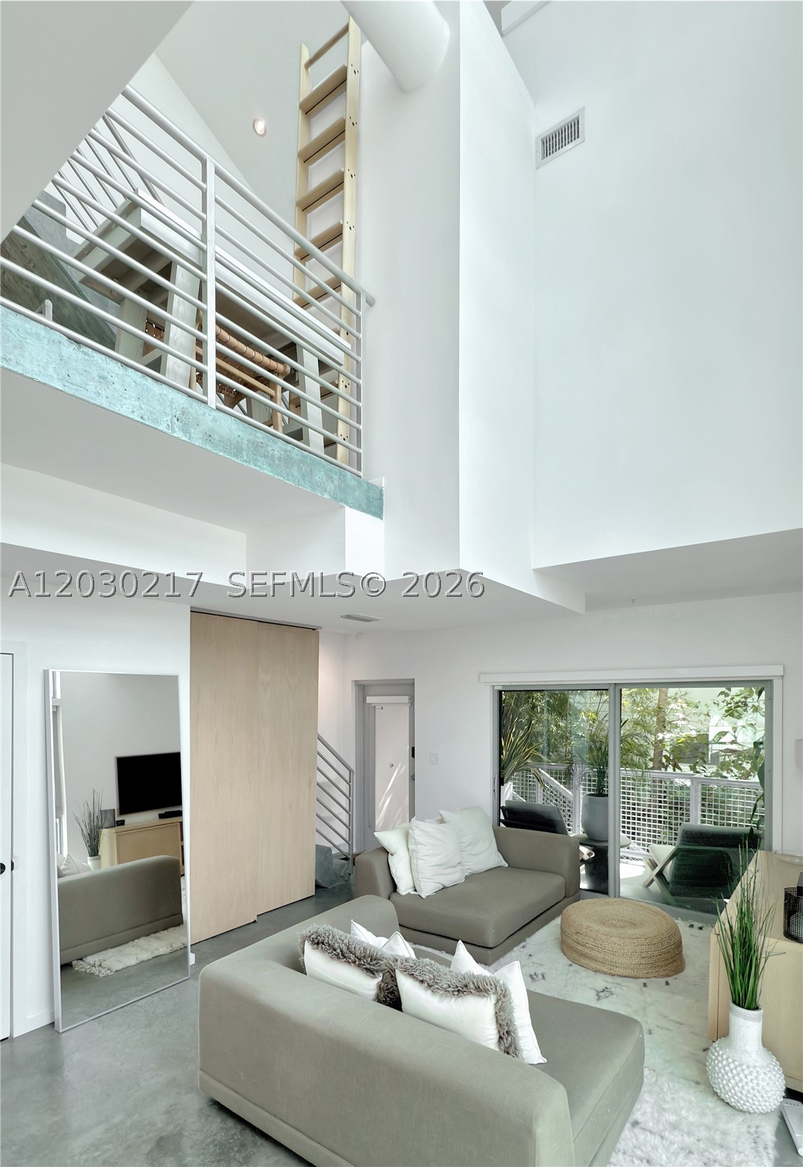 This exclusive and private residence gives you the opportunity to enjoy luxury in a prime location without the hassle of high rise living. Very low Maintenance fees. Two independent units 6 and 7 that are adjacent that combined will give 4 bedrooms, 4.5 baths, 2 private rooftop terraces, 2 cover parking spaces in a complex of only 7 townhouses. This 2 Modern South Beach Tri-level townhomes loft style can be combined for a total of 2890 sq feet. Currently generating $12,500 per month of income. Soaring 28 ft ceilings. Secure complex with only 7 Townhouses . White porcelain plank floors, stained concrete floors throughout respectively. Bright open living space, high Impact windows and doors. Unbeatable location within 2 blocks to the shopping center on Alton Rd and 5th Ave. Walk to Flamingo Park, the Beach, Lincoln Road, shops, restaurants. Publix, Total Wine and Whole Foods 2 small blocks away.