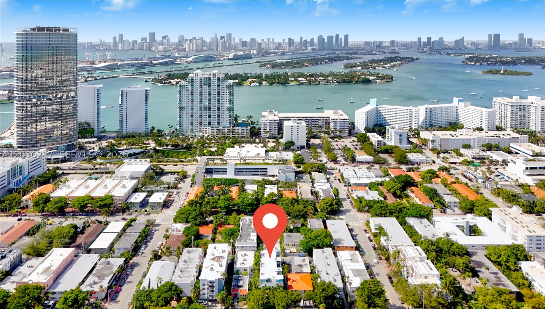 This exclusive and private residence gives you the opportunity to enjoy luxury in a prime location without the hassle of high rise living. Very low Maintenance fees. Two independent units 6 and 7 that are adjacent that combined will give 4 bedrooms, 4.5 baths, 2 private rooftop terraces, 2 cover parking spaces in a complex of only 7 townhouses. This 2 Modern South Beach Tri-level townhomes loft style can be combined for a total of 2890 sq feet. Currently generating $12,500 per month of income. Soaring 28 ft ceilings. Secure complex with only 7 Townhouses . White porcelain plank floors, stained concrete floors throughout respectively. Bright open living space, high Impact windows and doors. Unbeatable location within 2 blocks to the shopping center on Alton Rd and 5th Ave. Walk to Flamingo Park, the Beach, Lincoln Road, shops, restaurants. Publix, Total Wine and Whole Foods 2 small blocks away.