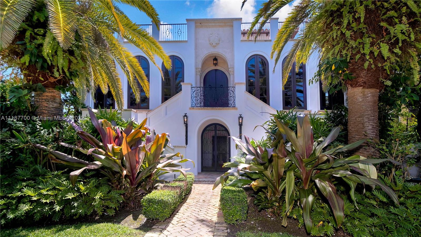 NEWLY PRICED Spectacular 6 beds, 5 baths, 3 half baths Mediterranean residence in corner lot on Key Biscayne's most desirable location, Mashta Island. Per owner 5,179 under A/C, Total Sq. Ft. 6,547. Highest quality finishes & appointments throughout, including vaulted & soaring wood ceilings, built-in mahogany bar, antique terracotta & wood floors, hand-painted wall tiles, rooftop family entertainment room with wrap-around terrace overlooking Miami's skyline & magnificent sunsets.  Wrought iron gates, spacious covered courtyard adjoining pool area, lush landscaping with timed lighting, hurricane impact windows throughout, lawn sprinkler system and retaining wall built on pilings. An entertainers dream meticulously designed to accommodate and provide space and privacy for the whole family.