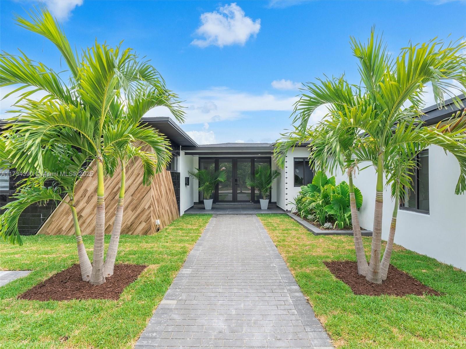 Nestled in prestigious, guard-gated Normandy Shores community in Miami Beach, this luxurious residence epitomizes refined island living. Boasting expansive open-concept design, this 5 bed/4.5 bath turn-key home includes additional oversized room, offering space & versatility. Indulge in sophistication of high-end appliances & premium finishes. Meticulously renovated w/ updated plumbing, electrical, roofing, & driveway. Coveted neighborhood offers wealth of amenities, including golf course, restaurant, tennis courts, parks, & scenic sidewalks. Enjoy the convenience of being near Miami's vibrant neighborhoods: Bal Harbour, South Beach, Wynwood, & Design District, ensuring a lifestyle of unparalleled excitement & elegance. Discover the perfect blend of luxury & location in this turn-key home.