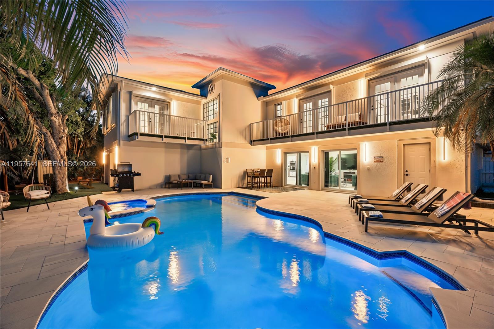 tunning 6-bedroom Pompano Beach estate offering over 5,000 square feet of beautifully designed living space—an exceptional value for a home of this size in Pompano Beach. Ideally located just a half block from the Intracoastal, this property delivers the perfect blend of luxury, space, and lifestyle.

The home features a fully renovated deck, resort-style pool, jacuzzi, outdoor bar, and outdoor shower, creating the ultimate entertaining oasis. Inside, enjoy a modern chef’s kitchen with stainless steel appliances, upgraded lighting throughout, and elegantly renovated bathrooms. Expansive porcelain flooring enhances the open, light-filled layout.

Step outside to a balcony with outdoor furniture, perfect for relaxing or hosting guests. All furnishings can be purchased, making this home truly turn-key—just bring your toothbrush. A rare opportunity to own a large, move-in-ready luxury home in Pompano Beach at outstanding value.