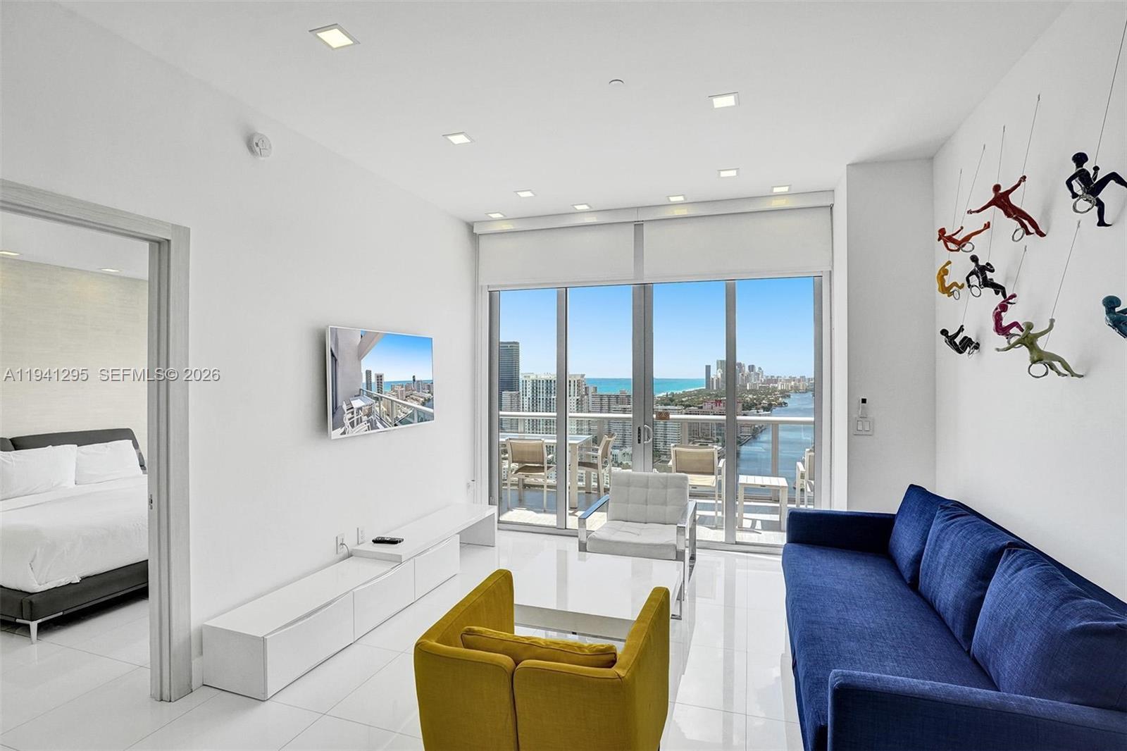 Premier corner penthouse offering the best two-bedroom layout and views in the building.
This rare southeast-facing residence delivers unobstructed panoramic views of the Intracoastal Waterway, city skyline, and Atlantic Ocean, making it one of the most desirable units available.

The penthouse features two king bedrooms and two full bathrooms, complemented by a fully equipped kitchen with top-of-the-line appliances and electronics, designed for both comfort and entertaining. Floor-to-ceiling windows fill the home with natural light and showcase breathtaking water and skyline views from every angle.

A standout feature of this residence is the private second-level rooftop terrace spanning approximately 500 sq. ft.—an exceptional outdoor living space ideal for entertaining, sunbathing in privacy, or hosting unforgettable gatherings with friends and family.

Located in a full-service luxury building offering pool, fitness center, valet, and concierge services, residents also enjoy convenient beach access via a complimentary shuttle service or a scenic walk over the Hallandale Bridge along the Intracoastal waterways.

This penthouse is not part of any mandatory hotel program, allowing owners full flexibility to use the unit as a primary residence, second home, or short-term rental including Airbnb, with the ability to self-manage. The unit has a strong income history, making it a rare opportunity that combines luxury lifestyle living with excellent investment potential.