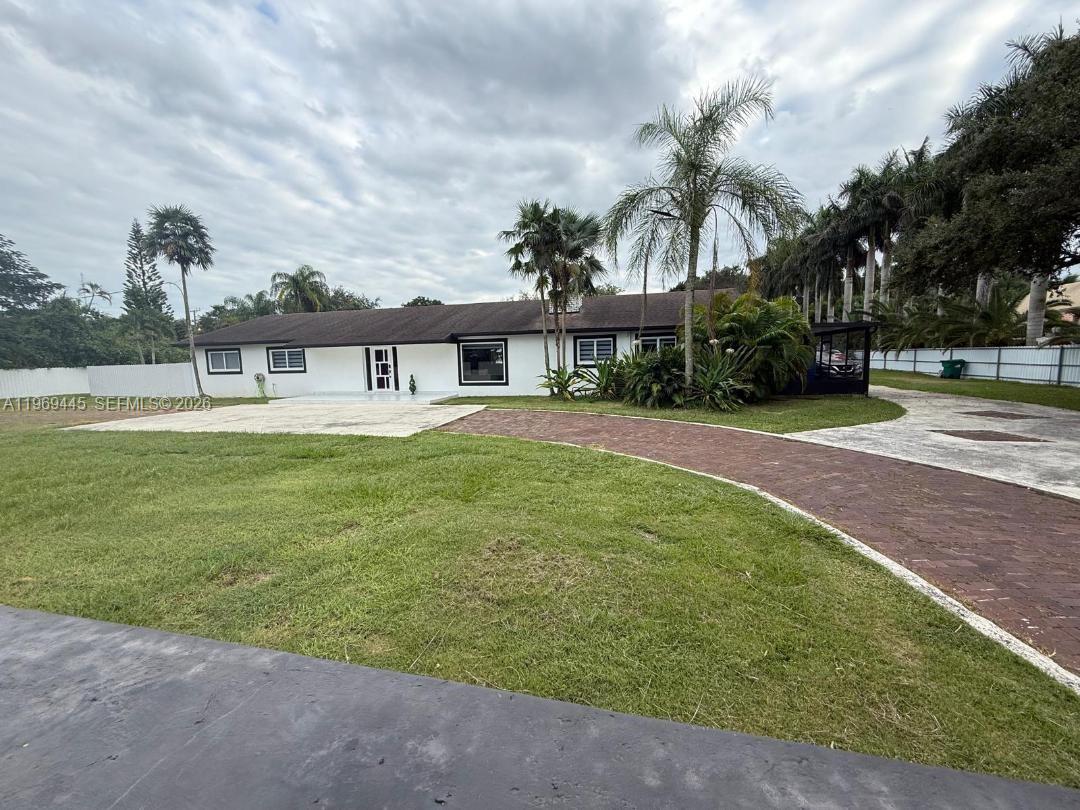 Experience spaciousness in all its South Florida splendor. Well maintained with 3008 SF of living area on a 34,412 SF lot. Main house is a 3/2 w/ separate apartment. Screened pool, cabana bath, foyer, formal living and dining room, combination family room and kitchen, fireplace, laundry, fully fenced, electronic gates. Perfectly located in The Redland area --Miami’s bountiful countryside. Castellow Hammock Nature Preserve is minutes away as is many of The Redland’s star attractions. Spend time hiking, bird and butterfly watching, go gravel bicycle riding on the area trails or visiting area's countless farm stands, specialty markets and parks. Miami may feel a world away, but quick access to major highways makes it an easy drive. Totally remodeled.