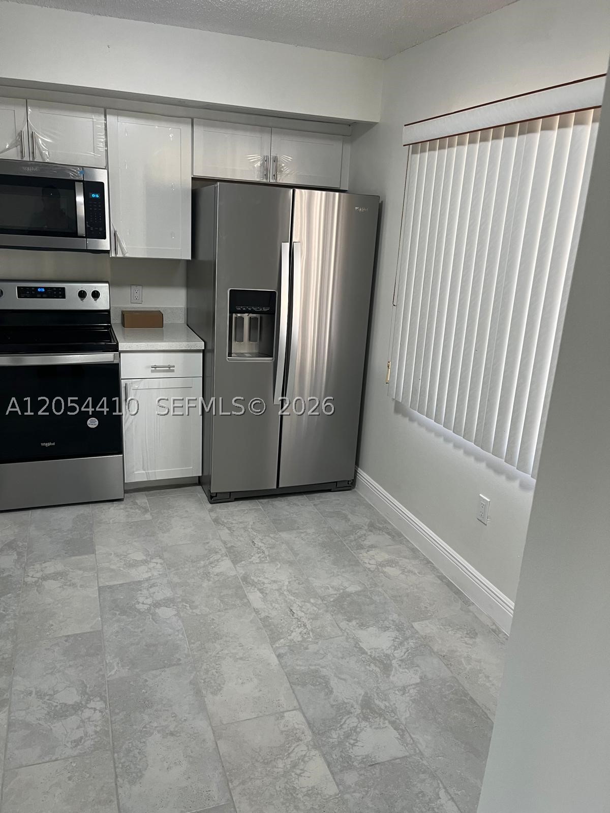 55+ Community recently remodeled! Make this condo your new place to lay your head. This beautiful community is well known for its pristine and manicured surroundings. This building is the newest as it was the last one built. New tiles have just been installed, new paint has been added, and new vanities and sinks have been added to both bathrooms. New in-unit washer & dryer and a balcony overlooking the beautiful lake view. This rental includes water, basic cable, internet, and endless resort-style amenities including a million-dollar clubhouse, fitness center, tennis courts, theater, indoor/outdoor pools, jacuzzi, game rooms, billiard room, shuttle bus service, pharmacy, and more. Located next to the shops of Pembroke Gardens and I-75. Must have min 650 credit per Association NO EVICTIONS. NO PETS.
