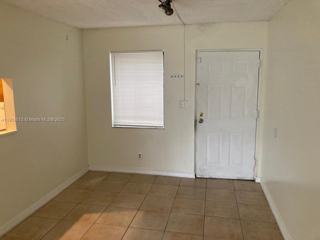 Upgraded Well Maintained 1 Bedroom, 1 Bath Condo at Presidential Golfview on The First Floor. Close to Shopping, Dining and More. Open Balcony, Stove, Refrigerator and Microwave. Lots of natural light. Walk in closet in bedroom. Tenant Occupied 11/28/2026 and pays $1600.00 per month.
