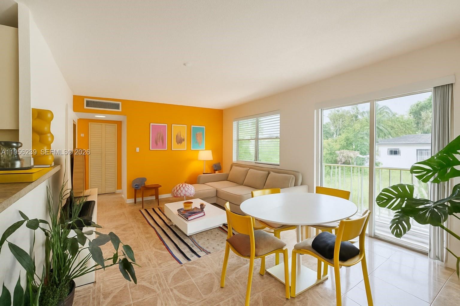 Welcome to this bright and spacious corner unit. This 1-bedroom, 1-bath condo also includes a versatile den ideal for a home office, playroom, or even a cozy second bedroom. Enjoy peace of mind with brand new upgrades, including a tankless water heater, new AC unit, new electrical panel, and a washer hookup for added convenience. The kitchen features updated cabinets and countertops, while modern recessed lighting keeps the space airy and inviting. Relax on your private screened balcony or unwind by the community pool. This secure, gated community offers covered, assigned parking, low HOA fees, and on-site laundry. Conveniently located near major highways, shopping, dining, and more, this is your chance to own a move-in-ready home in North Miami! Me, People & Places.
