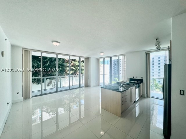 Beautiful 2 bed 2 bath Corner-unit at Axis on Brickell. Unit features Floor to Ceiling Windows with access to the balcony from both bedrooms and living room. Wraparound wide balcony, white floors. BEST LOCATION in the Heart of Brickell. Contemporary European cabinetry, modern appliances, assigned PARKING SPACE. AMENITIES Include: state of the art Gym, Spa, Two Infinity edge pools, Kids Playroom, Business center, BBQ area, management on site, 24hr concierge, valet and security. Across from metro rail. TENANT OCCUPIED THROUGH 7/17/2026. Video Tour available upon request.