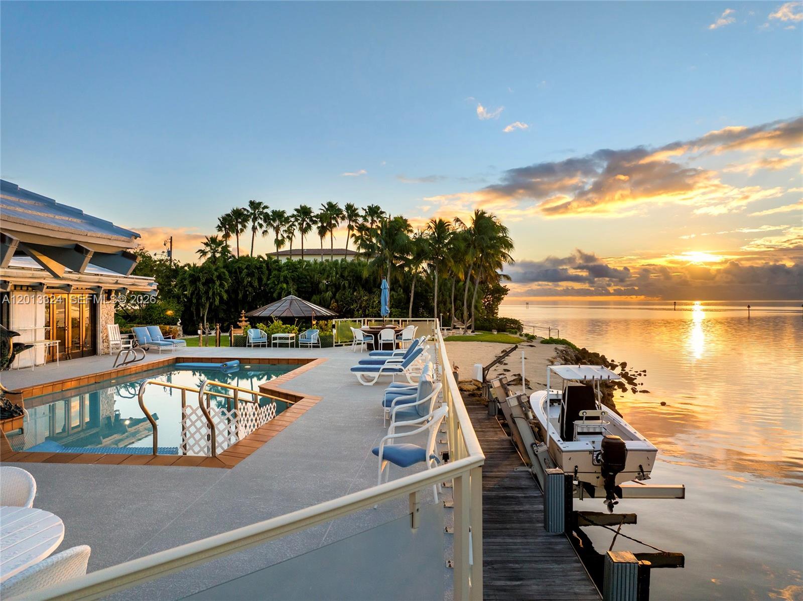 "My Paradise” lives up to its name. Set on a remarkable 32,025 SF lot with 250 feet of unobstructed, pristine waterfront views on both sides, this exceptional property presents a rare opportunity to create a world-class estate with unparalleled redevelopment flexibility, privacy, and natural beauty. Capturing breathtaking sunrise-to-sunset views across Biscayne Bay, Downtown Miami, Miami Beach, and Key Biscayne, it is privately positioned at the end of Lugo Avenue. The resort-style grounds feature lush tropical landscaping, wooden and coral stone walkways, a gazebo, sandy beach, summer kitchen, and tranquil fountains. An elevated pool deck with glass railings frames sweeping bay and island vistas. A true yachtsman’s retreat, the property includes a 66-foot dock with boat lift, a spacious boathouse, and plans in progress to extend to 100 feet. Ideally located just minutes from Coconut Grove, Downtown Miami, Miami Beach, and Miami International Airport, and close to fine dining, premier shopping, cultural and sporting venues, and top-rated schools. This offering represents an extraordinary opportunity to develop a landmark waterfront estate in one of Miami’s most coveted locations.