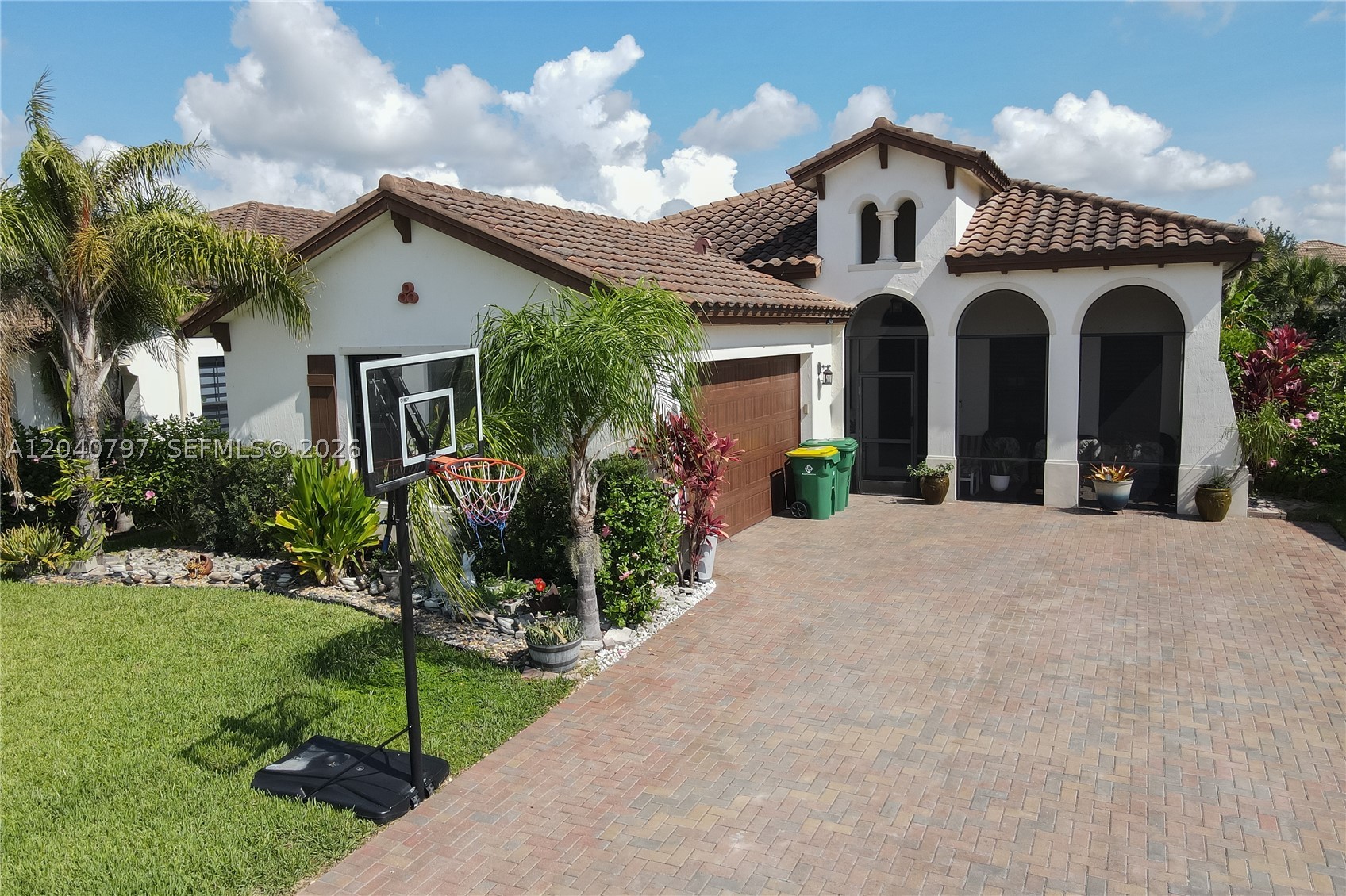 Beautiful single-story home featuring 3 bedrooms, 3 bathrooms, and a versatile den that has been converted into an additional bedroom. This spacious home offers high ceilings throughout, creating an open and airy feel. The large kitchen is perfect for entertaining and boasts granite countertops, ample cabinetry, and plenty of workspace. The expansive driveway accommodates up to 4 vehicles, providing convenient parking for family and guests. Step outside to enjoy the generous backyard, offering plenty of space for outdoor gatherings, gardening, or relaxation. A wonderful opportunity to own a spacious and functional home with room for everyone!