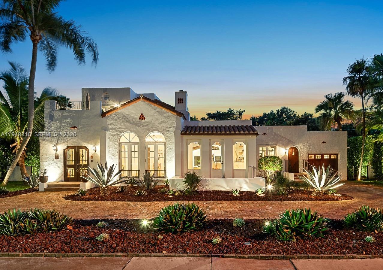 Designer-owned and completely renovated historic home overlooking the Granada Golf Course, with awe-inspiring views of landmark banyan trees on the 6th fairway. This 4BR/3.5BA Old Spanish home seamlessly blends modern open living with preserved architectural charm, offering a rare combination of character, comfort, and move-in-ready convenience. A sun-filled, open-flow layout centers around a chef-worthy kitchen with custom Vermont-made cabinetry, Sub-Zero, Wolf & Kohler fixtures. Expansive family room opens directly to a resort-style pool & patio, ideal for indoor-outdoor entertaining. All 3 main bedrooms feature large walk-in closets. Upstairs primary suite enjoys tranquil golf course views & a charming sun porch. 4th bedroom is perfect for live-in help or in-laws. Design details include meticulously restored vintage doors, imported custom iron chandeliers, and a rare 1923 solid cast-iron soaking tub. Additional highlights include a home office with separate entrance, fully finished and air-conditioned garage currently used as a gym, commercial-grade IT with Cat 6 wiring throughout, AV, CCTV, storm windows, solid concrete block construction, and Trane central AC systems. Located outside a flood plain and adjacent to the Granada Golf Course, engineered to provide natural water absorption. A truly special Coral Gables offering—historic, refined, and turnkey—just minutes to the Biltmore Hotel, Country Club, parks, Miracle-Mile dining, and Miami International Airport.
