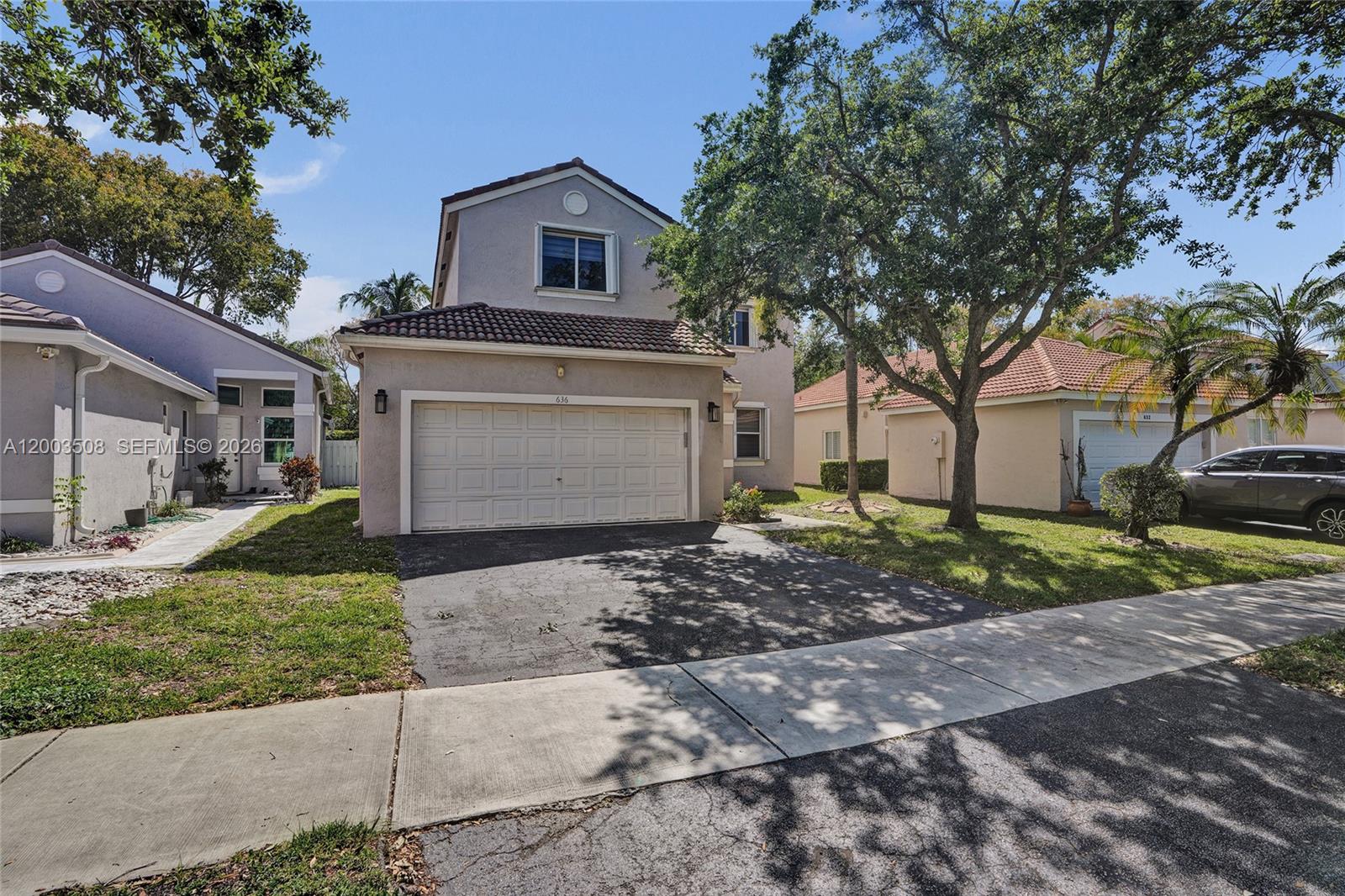 4 Bedrooms | 2.5 Baths | Move-In Ready — Located in one of Weston’s most sought-after **guard-gated communities**, known for its security, pride of ownership, and access to **top-rated schools**—one of the key reasons buyers choose Weston.The home features a remodeled kitchen and updated baths, offering a functional layout ideal for everyday living. Prime location with easy access to parks, shopping, and major highways. Guard-gated community. A-rated school district. Smart home features.