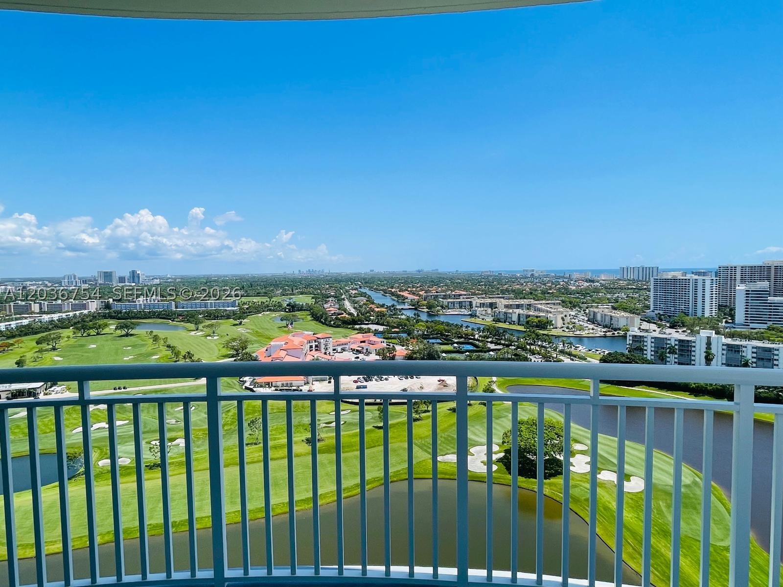Stunning views of the recently renovated Shell Bay Golf Course and the ocean from this luxurious corner condo. Featuring two large balconies connecting all three bedrooms and the living area, this tastefully and modern decorated, fully furnished unit accommodates up to 6 residents. The split floor plan includes a spacious laundry room with a brand-new washer and dryer. Located just a short walk from the beach, restaurants, and shops on Hallandale Beach Blvd, it offers the perfect blend of relaxation and metropolitan lifestyle. Resort style amenities such as Heated pool, spa, tennis court, gym, sauna, valet parking. Rent includes WATER, CABLE TV, INTERNET and TOTAL APPLIANCE SERVICE CONTRACT. Ideal for those seeking upscale coastal living. Best view on the building, ready