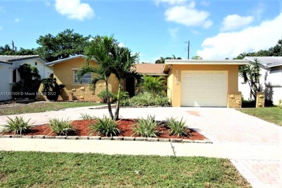 This updated home has an inviting living space filled with natural light and lined with sleek tile flooring. Whip up some great game-night snacks in the kitchen with coordinating appliances, beautiful cabinetry, and stylish counters. The spacious bedrooms match the chic, modern style of the home and come with built-ins in the closets. In the back of the home, you'll find a patio and spacious backyard, perfect place to spread out and make memories.