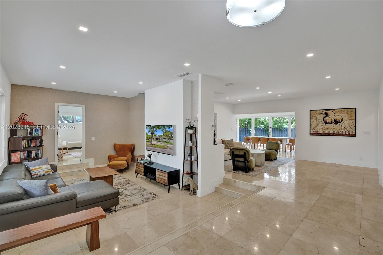 Welcome to 18641 NE 21st Avenue, a beautifully updated residence situated on a spacious 10,000-square-foot corner lot in the highly desirable Skylake neighborhood of North Miami Beach. Offering 3 bedrooms, 3 bathrooms, and over 2,650 square feet of living space, this bright and inviting home blends modern updates with comfortable family living.

Designed with an open-concept layout, the home features expansive living and entertaining areas filled with natural light, a spacious chef’s kitchen, and seamless flow throughout. Elegant finishes, impact windows and doors, updated bathrooms, and thoughtfully designed interiors create a move-in-ready experience.

The generous lot provides ample outdoor space for entertaining, relaxing, or future customization, while the prime Skylake location offers convenient access to Aventura, major highways, houses of worship, top-rated schools, shopping, dining, and beaches.

A rare opportunity to own a renovated corner-lot home in one of North Miami Beach’s most sought-after neighborhoods.