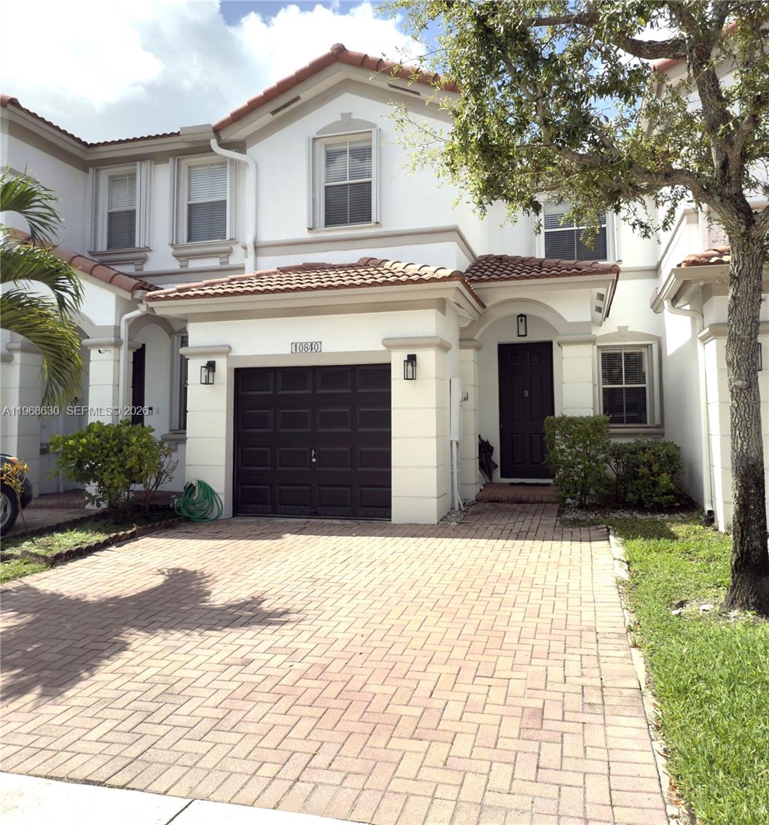 This is your opportunity to own the largest 3-bedroom model in the highly sought-after Antilles at Islands at Doral. This lovingly cared for townhouse features a bright, open floor plan designed for modern living. The interior boasts spacious living, dining, and family areas perfect for relaxation and entertaining. The kitchen is equipped with new SS appliances, wood cabinetry, & granite countertops. Enjoy high-quality finishes with neutral tile on the first level and stylish laminate on the second. The home includes full accordion shutters, a 1-car garage, and a private patio. Roof maintenance included in HOA! Near to A+ schools, Antilles’ pool & Legacy Park. Also enjoy exclusive access to the world-class Islands at Doral Clubhouse: pool, tennis, gym, basketball & more. Excellent location! Minutes from entertainment, airport, universities, major highways, etc. Don't miss this incredible value! Contact me today!